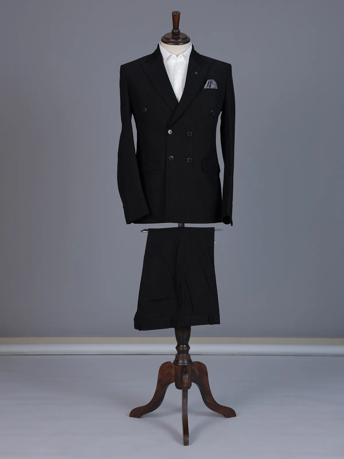 Black pinstripe formal double breasted suit with wide peak lapel