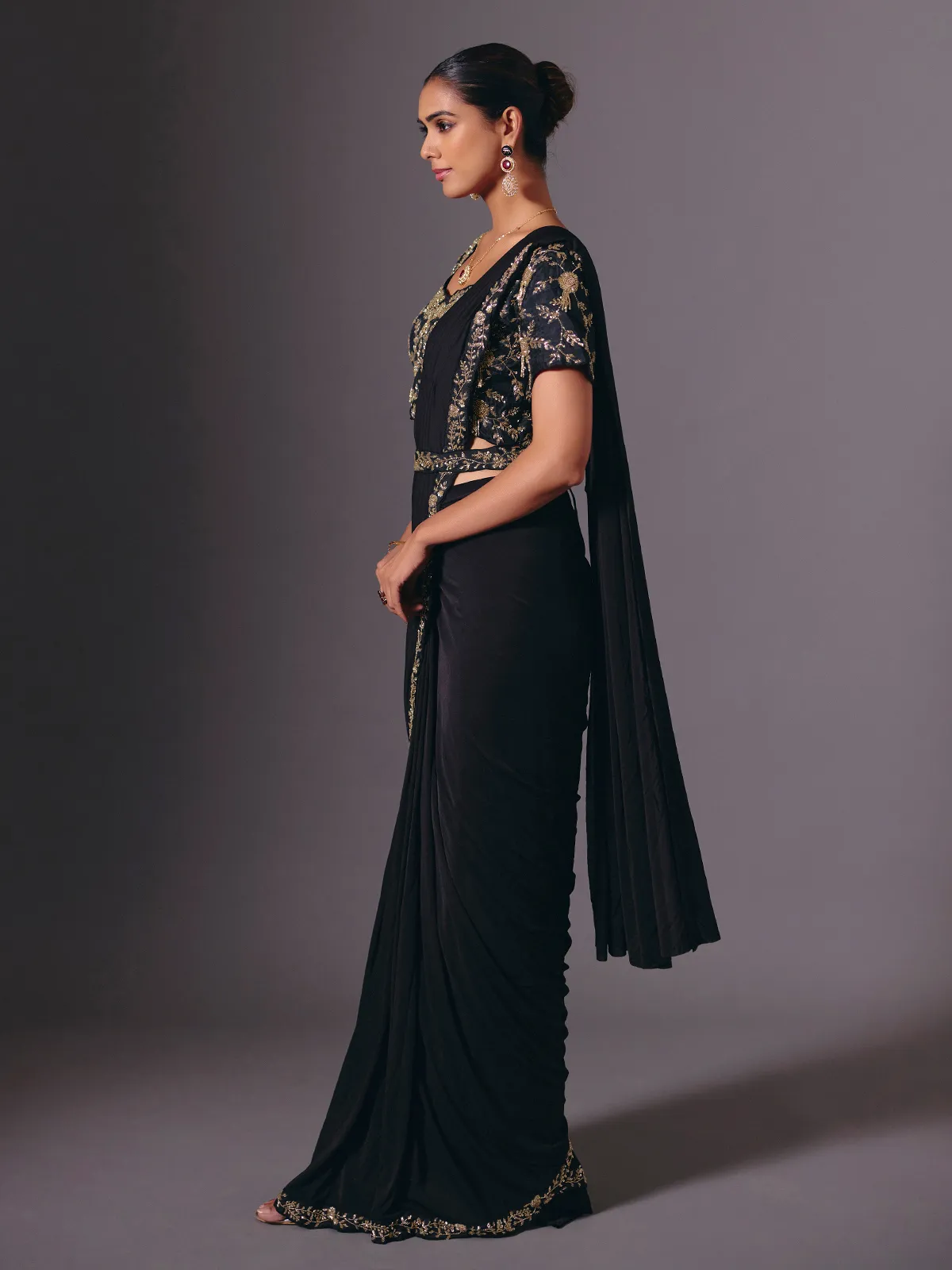 Black satin lycra saree with elegant festive embellishments