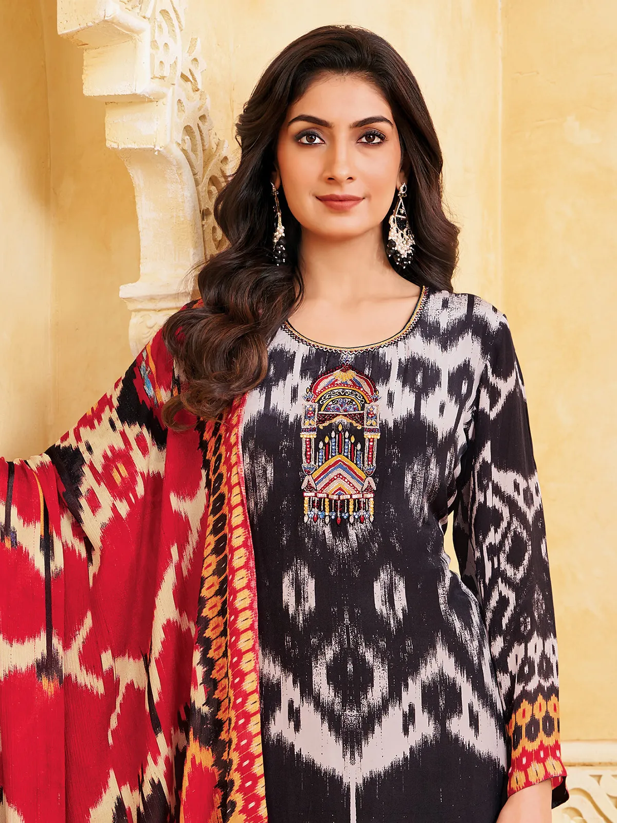 Black silk printed straight cut salwar suit with contrast dupatta