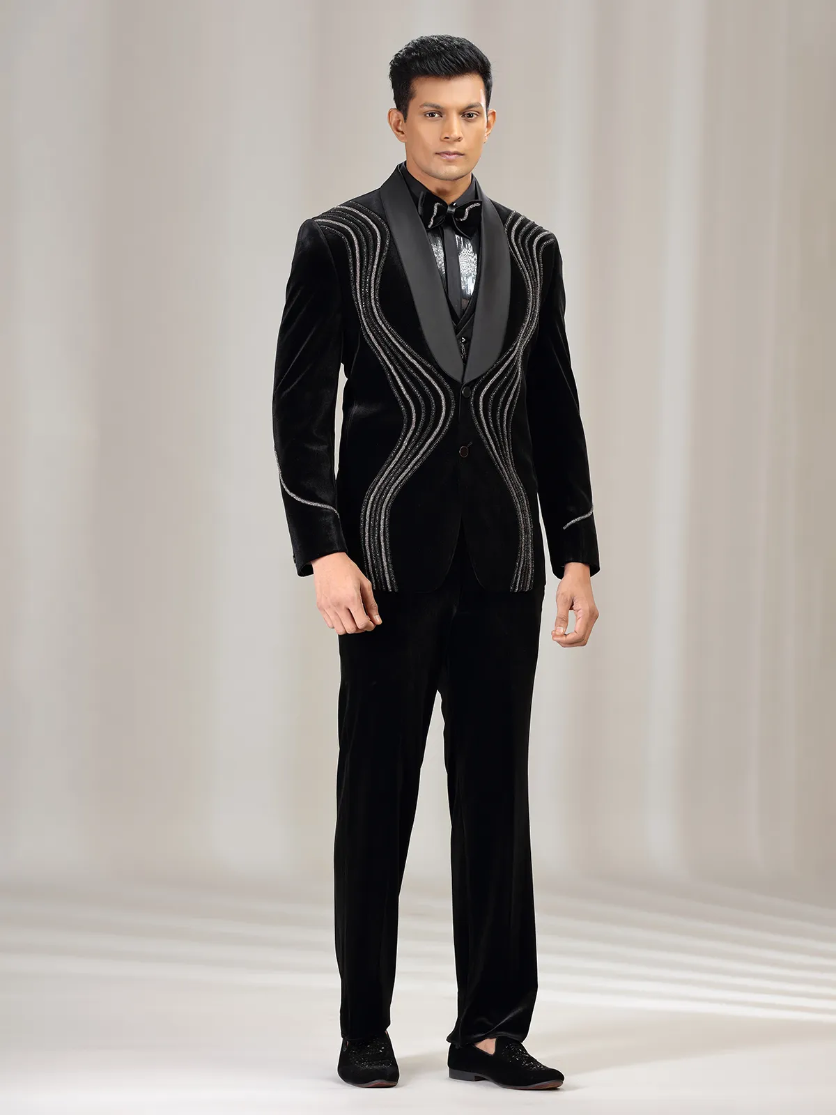 Black velvet coat suit with bead and diamond embellishment