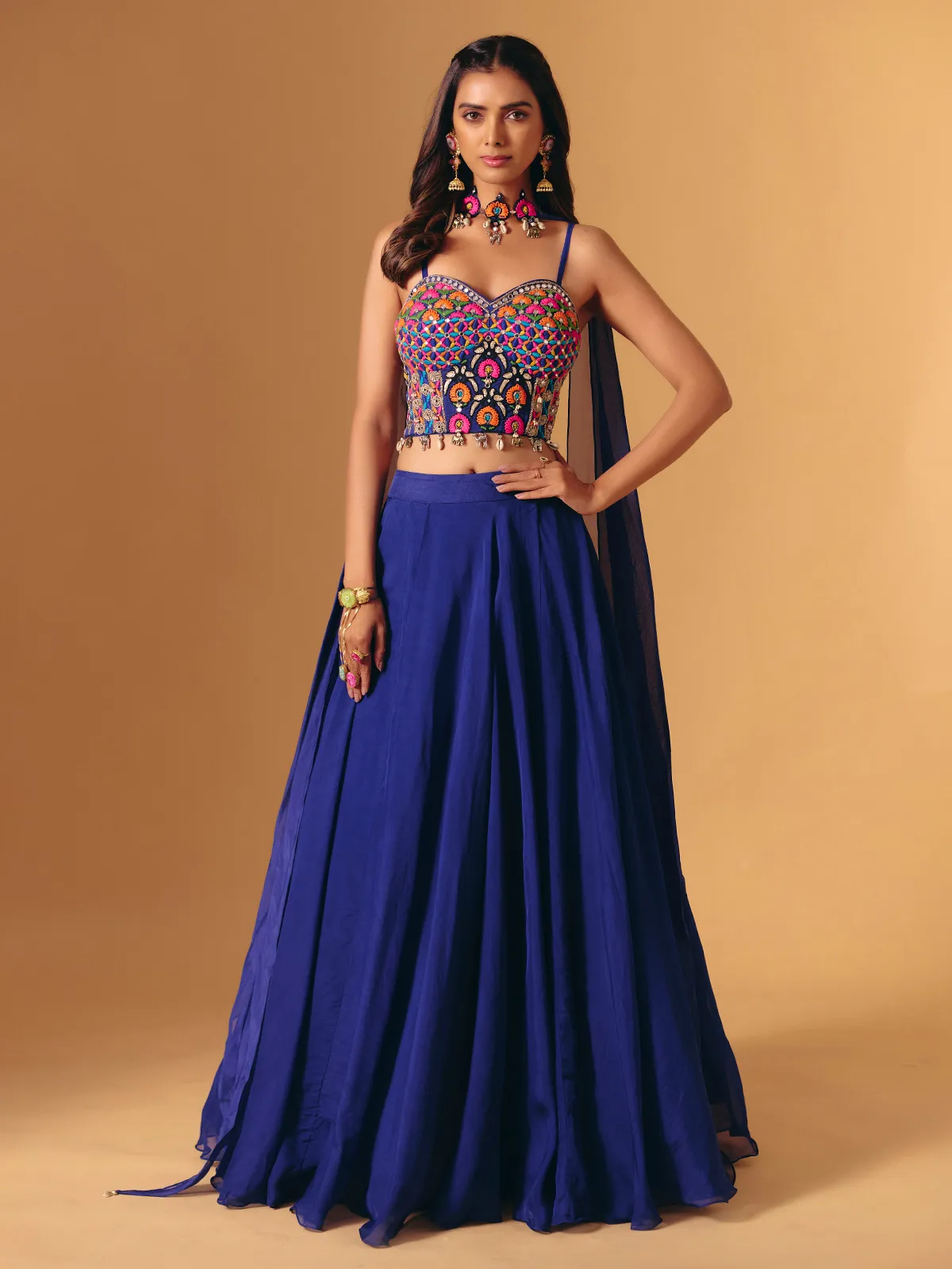 Blue georgette lehenga choli with cowrie shell