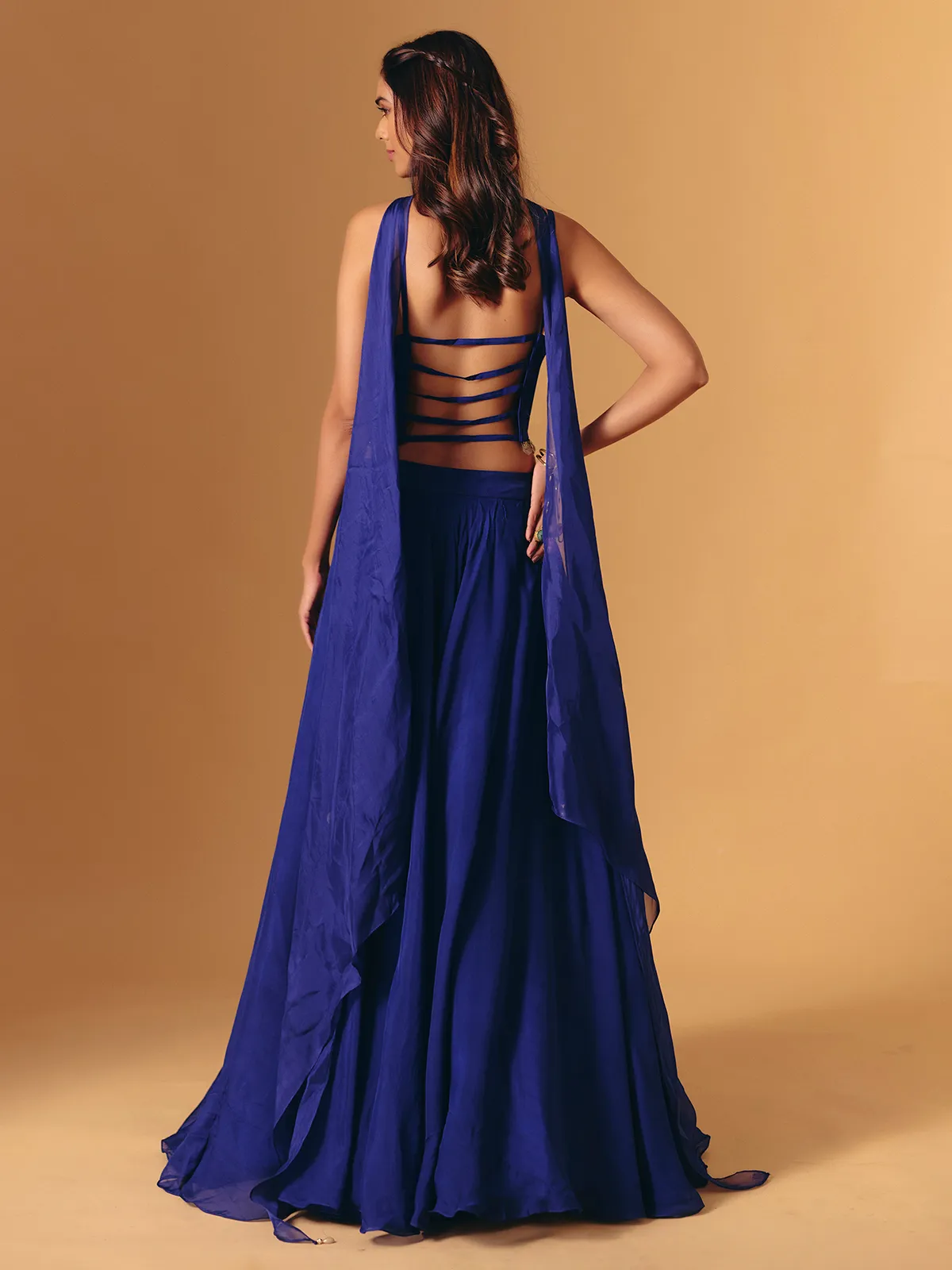 Blue georgette lehenga choli with cowrie shell