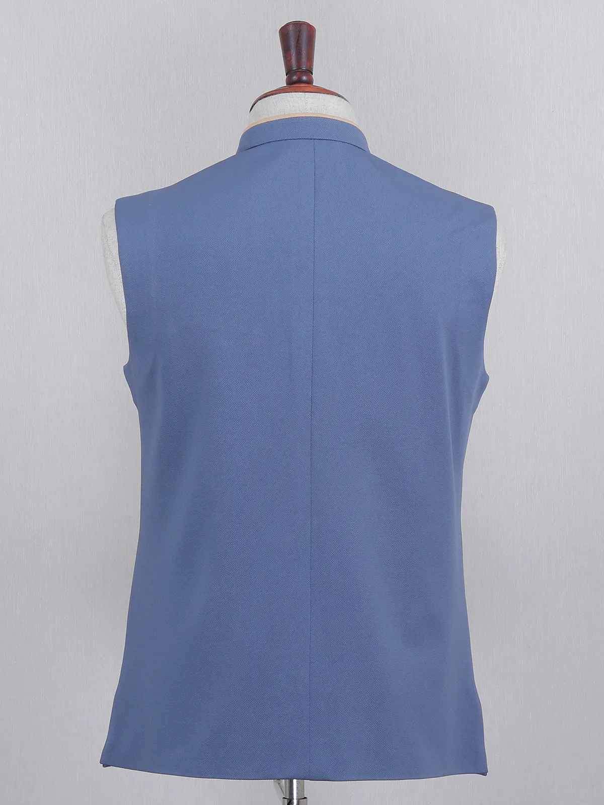 Blue hued solid waistcoat in silk