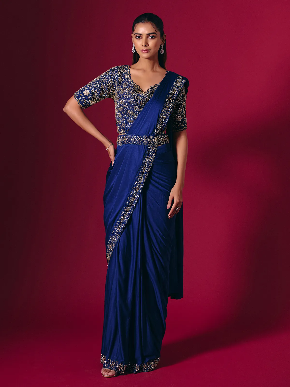 Blue lycra saree enhanced with sequins and cutdana work
