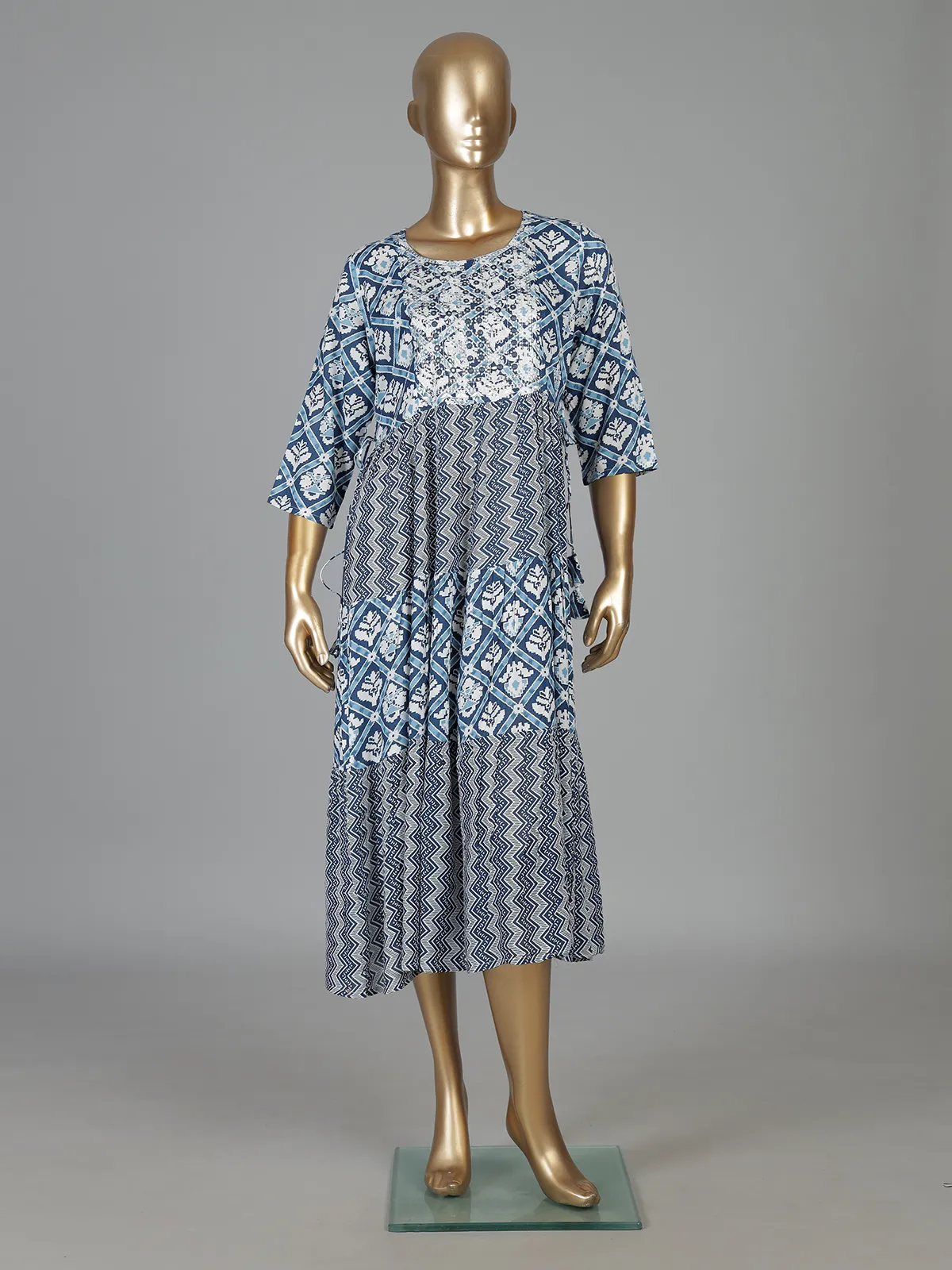 Blue printed cotton kurti designed with worked yoke pattern