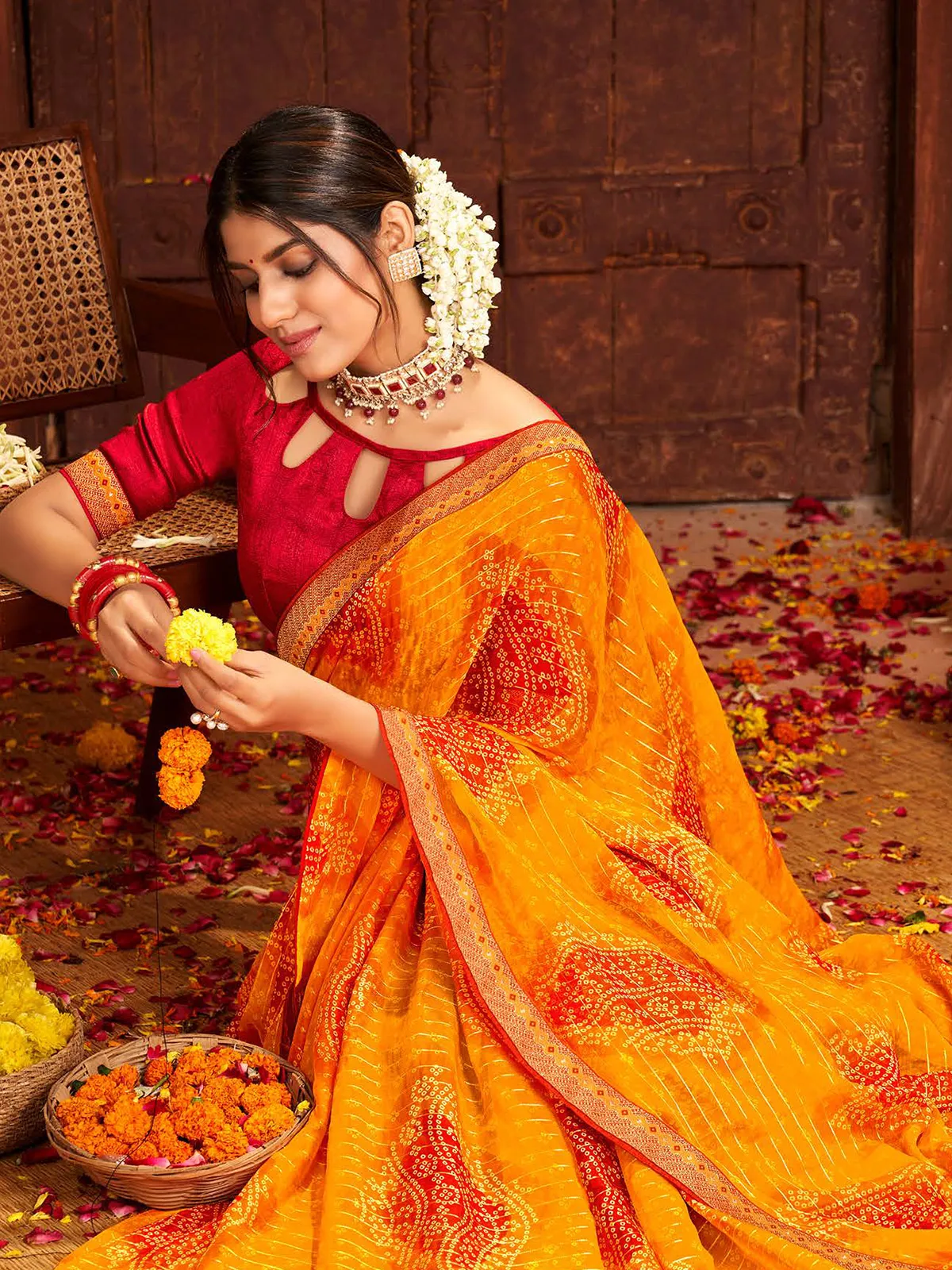 Bright yellow bandhej printed saree