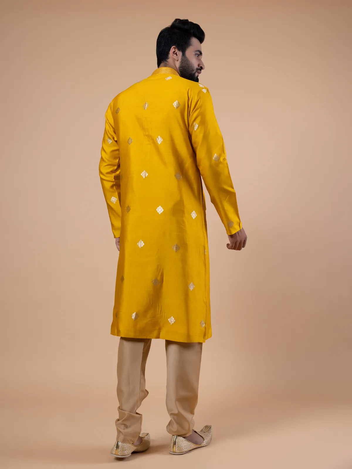 Bright yellow raw silk zari work kurta suit