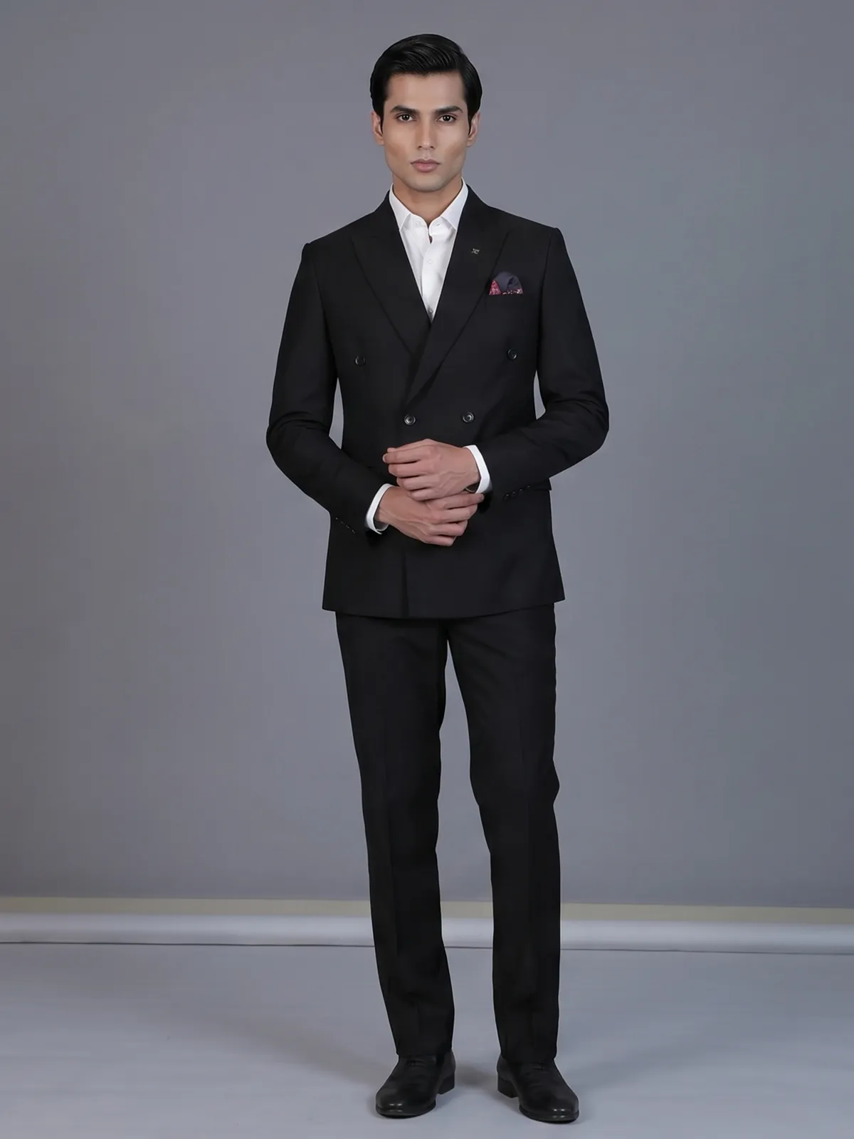 Classic black formal double breasted suit with bold peak lapel