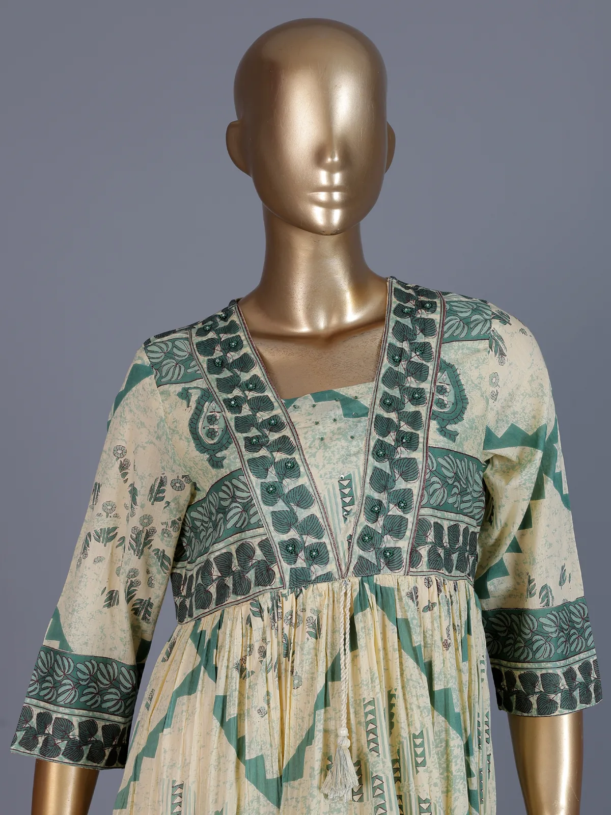 Cream and green floral printed cotton casual kurti