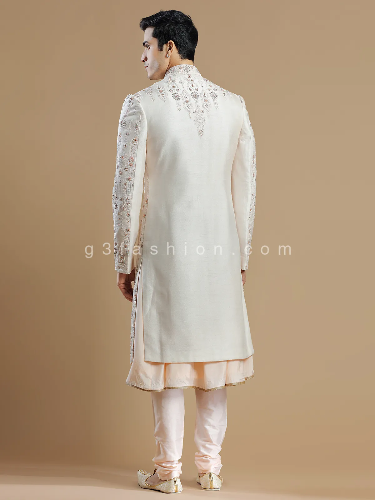 Cream and peach raw silk groom wear sherwani