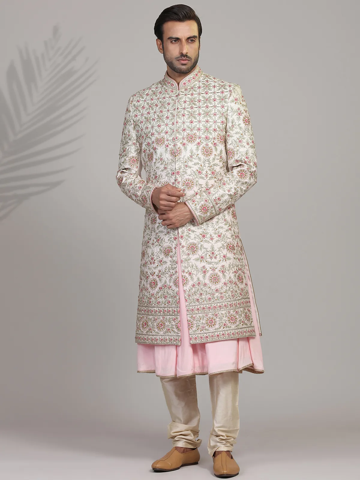 Cream and pink silk sherwani for groom