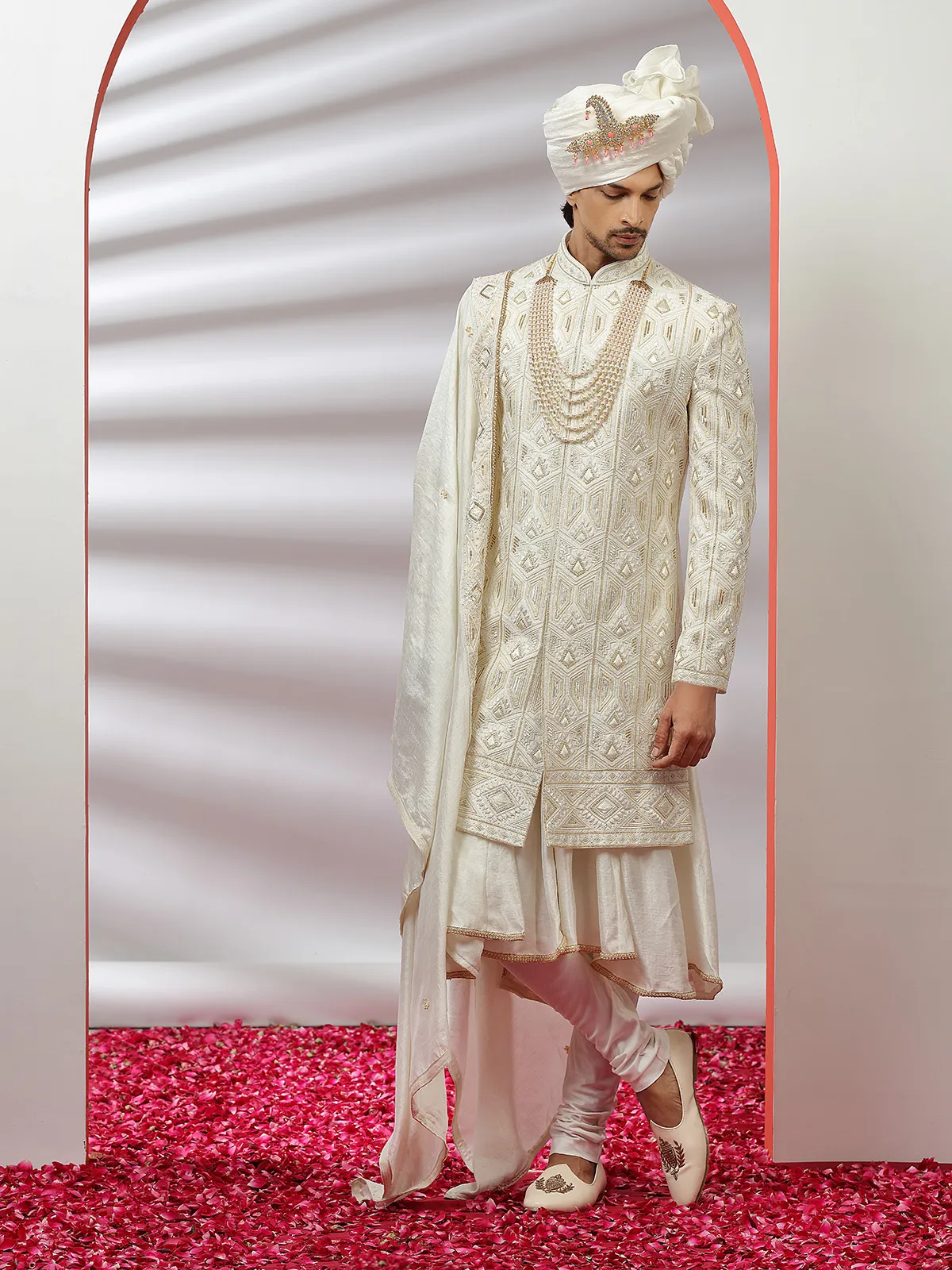 Cream color rich raw silk groom wear sherwani