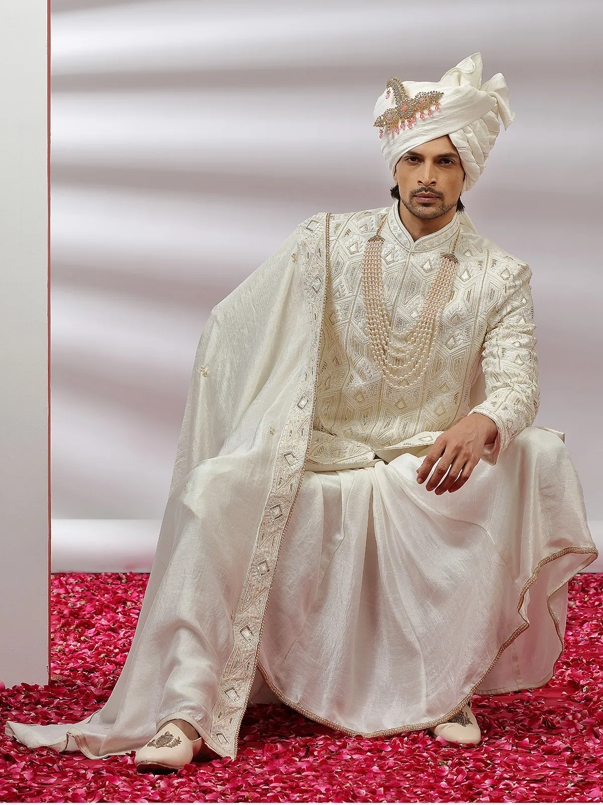 Cream color rich raw silk groom wear sherwani