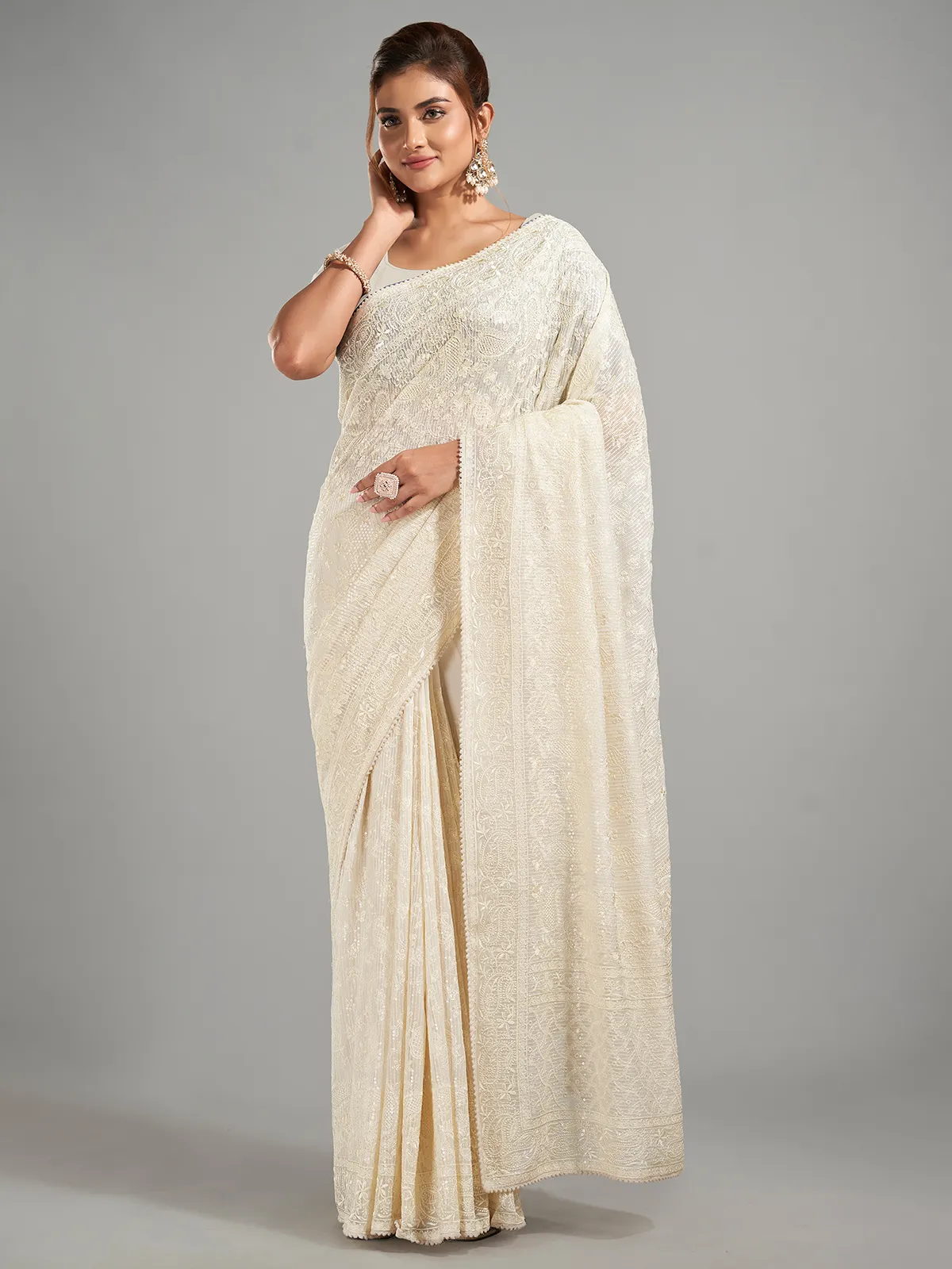 Cream georgette embroidery saree