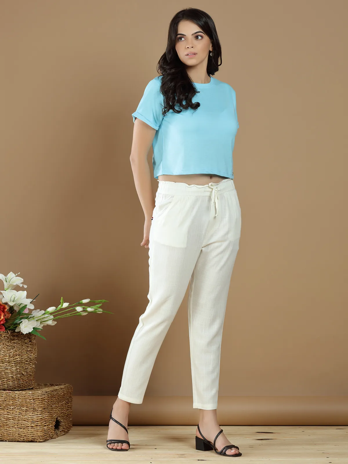 Cream hued linen casual wear plain pant