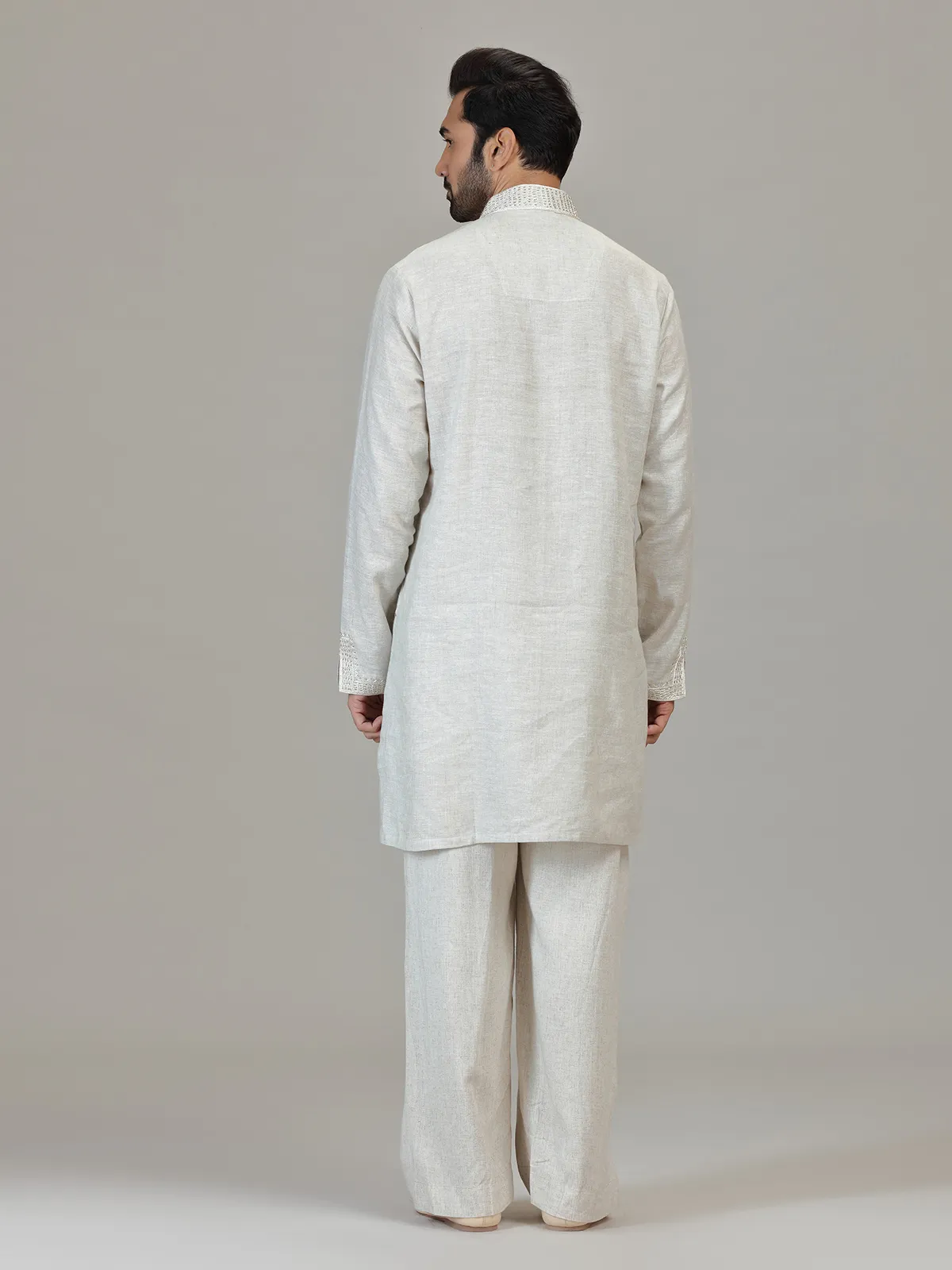 Cream linen resham embellished festive kurta ensemble