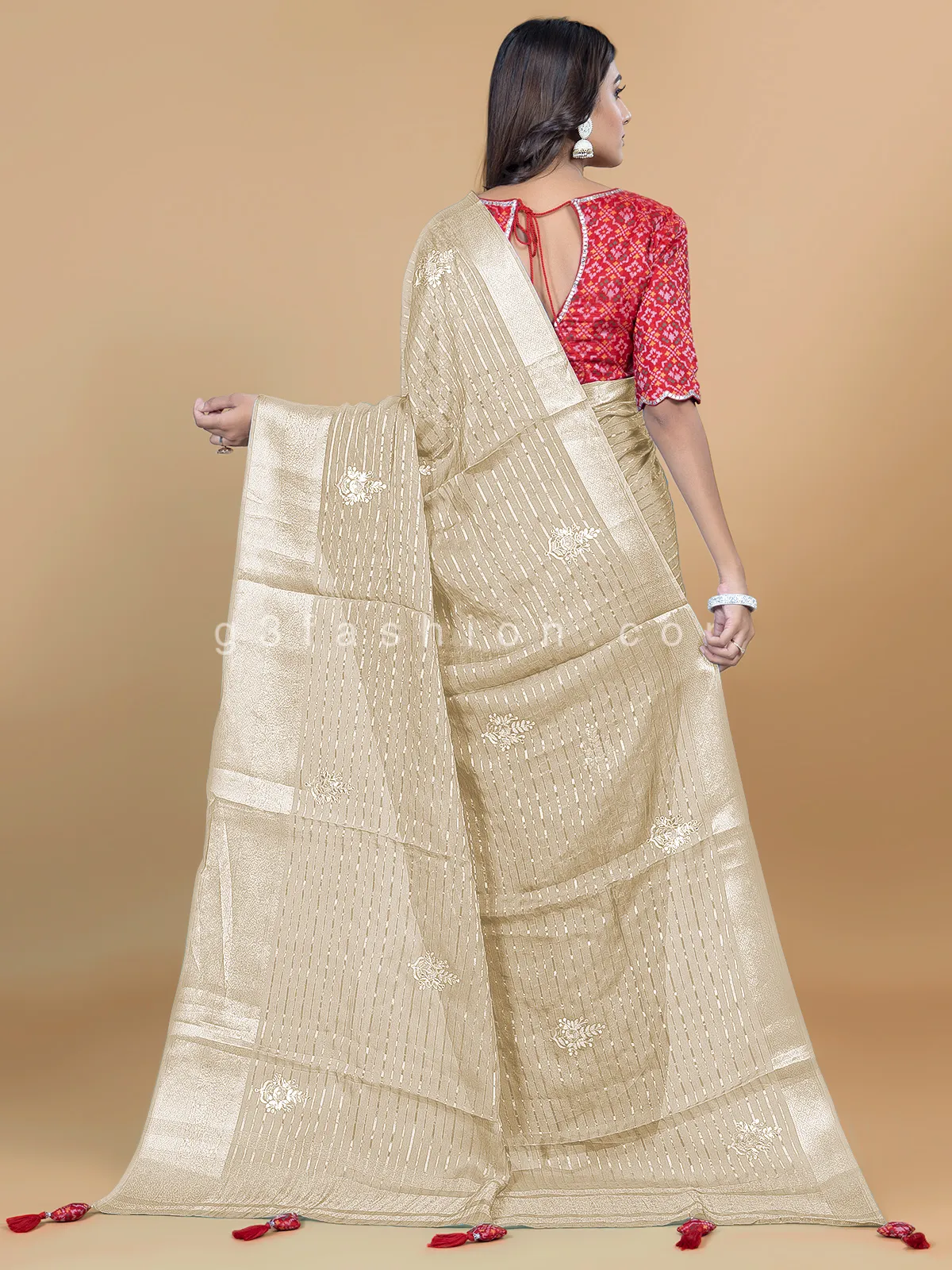 Cream organza festive look saree