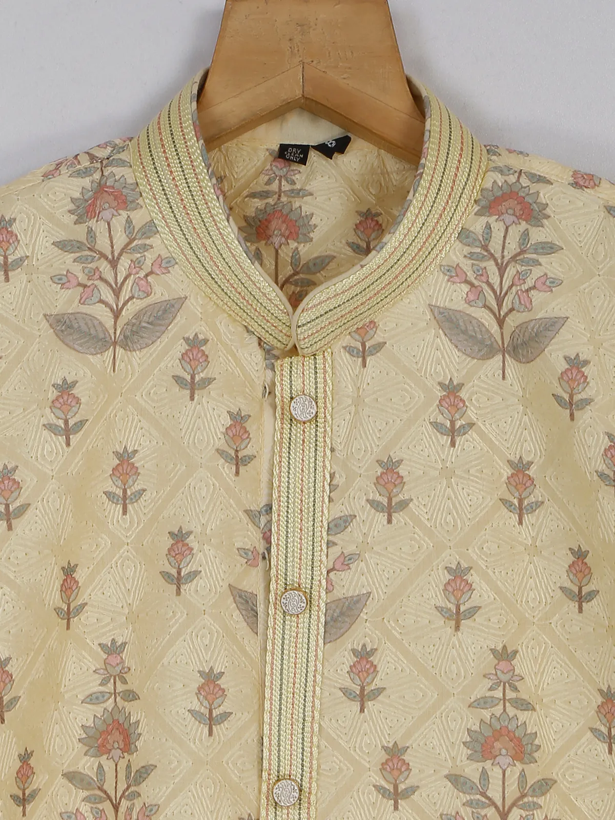 Cream printed kurta suit in silk