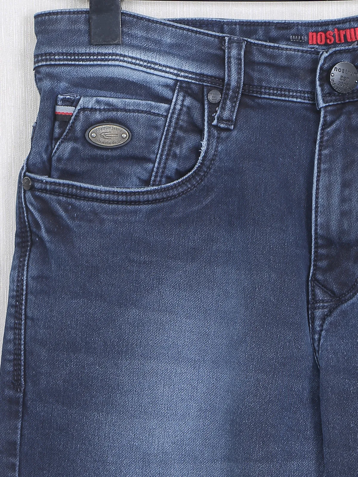 Dark blue colored washed jeans from Nostrum