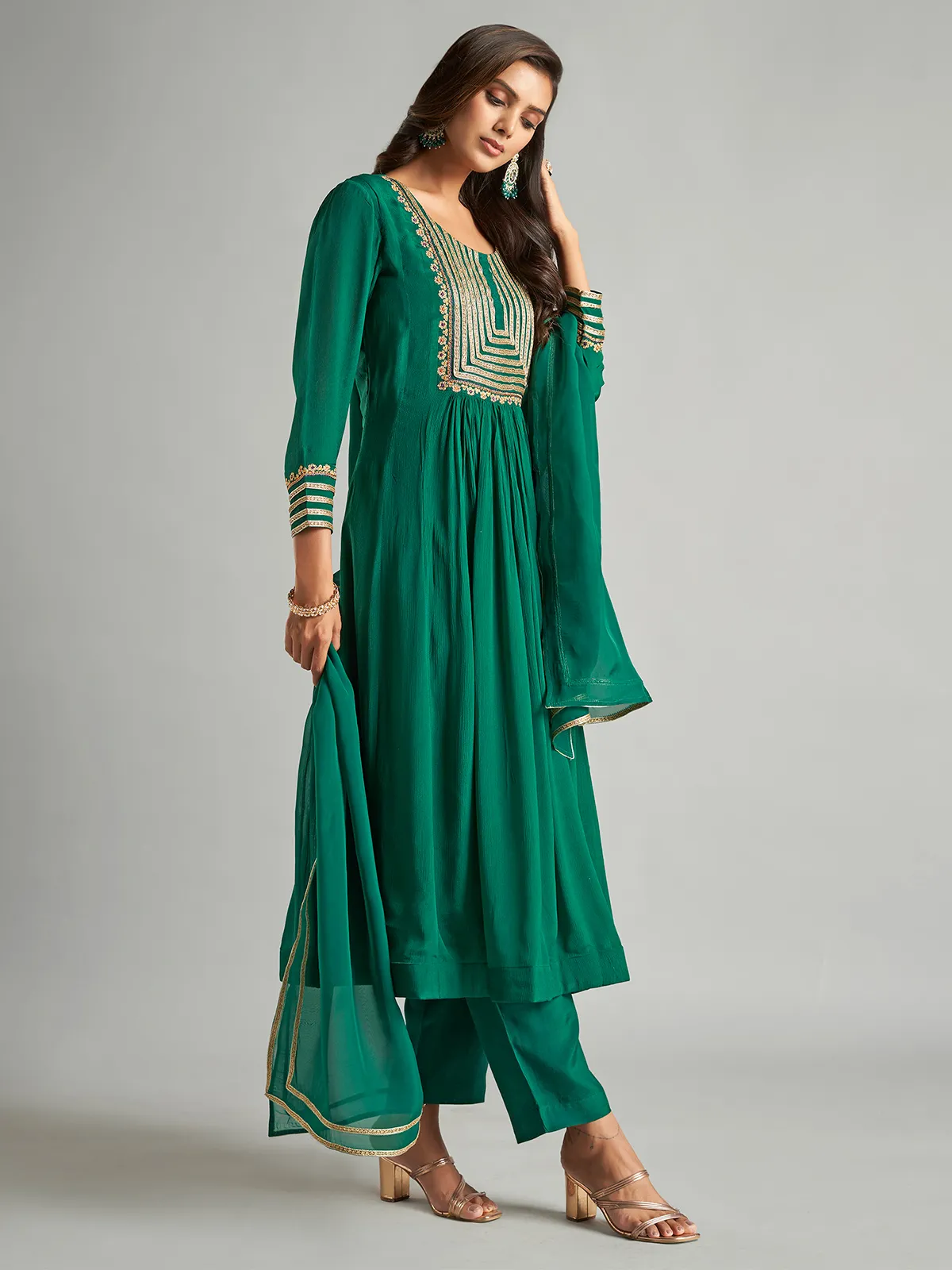 Dark green chiffon salwar suit for festive