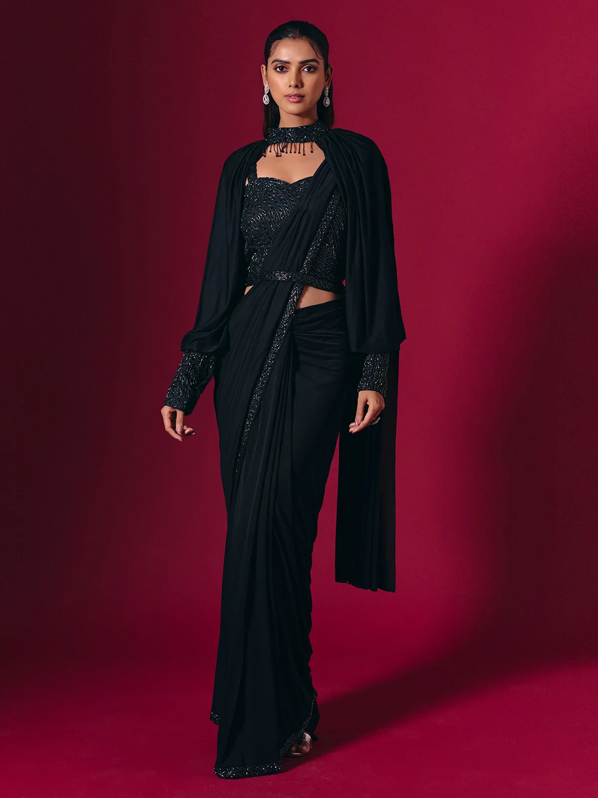 Elegant black lycra saree with cutdana pearl work