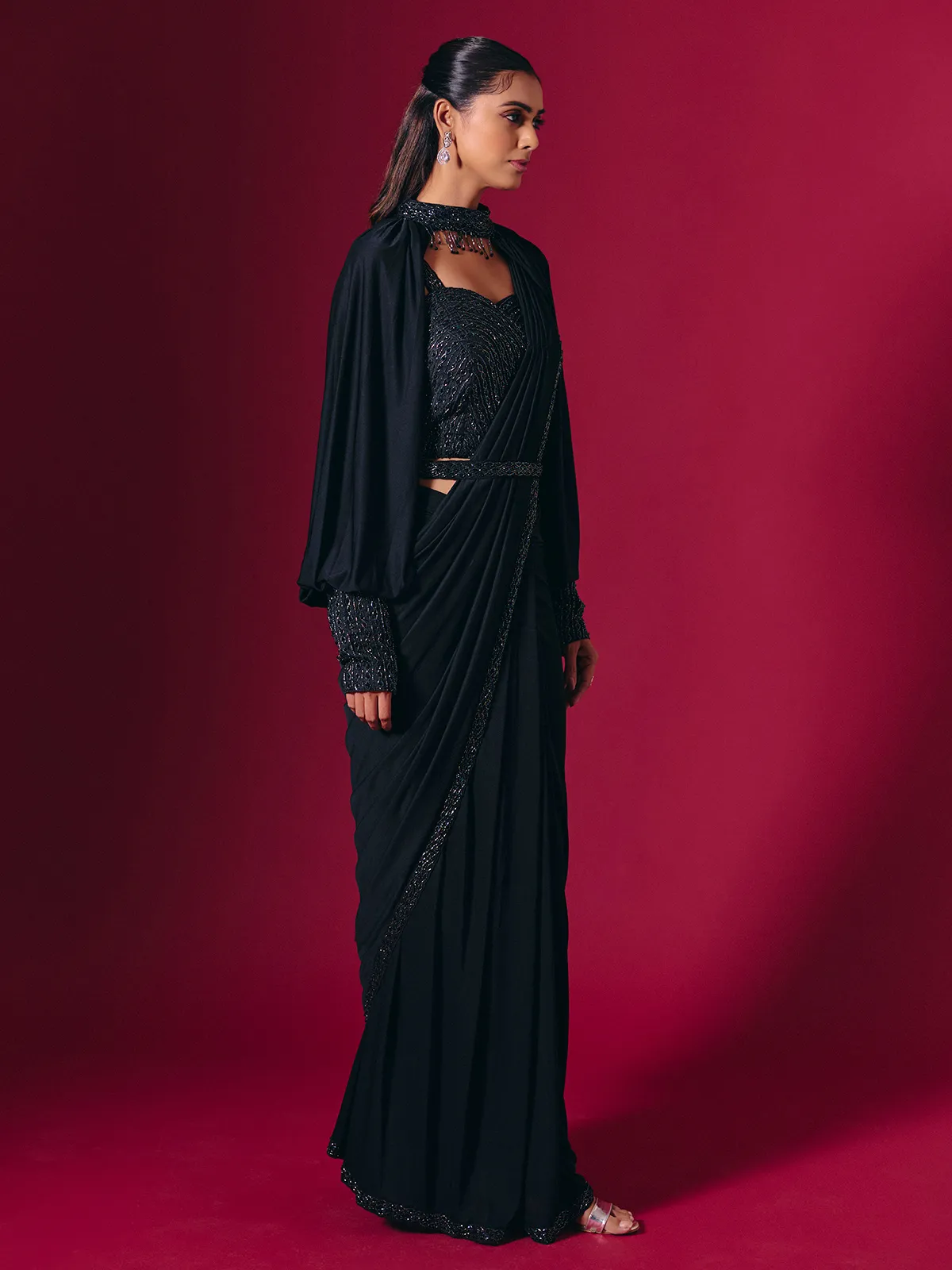 Elegant black lycra saree with cutdana pearl work
