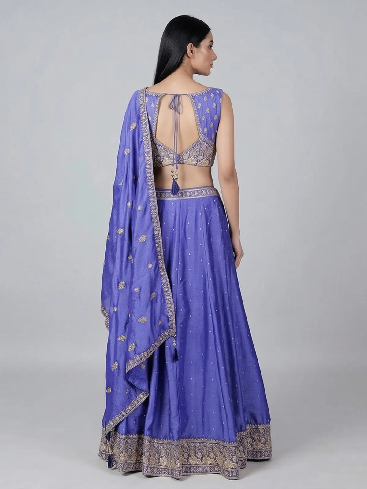 Elegant blue silk lehenga choli with shimmering embroidery details