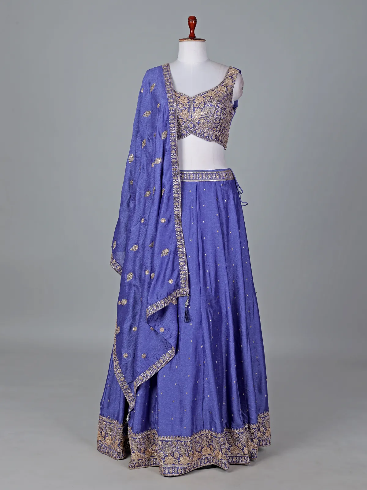 Elegant blue silk lehenga choli with shimmering embroidery details
