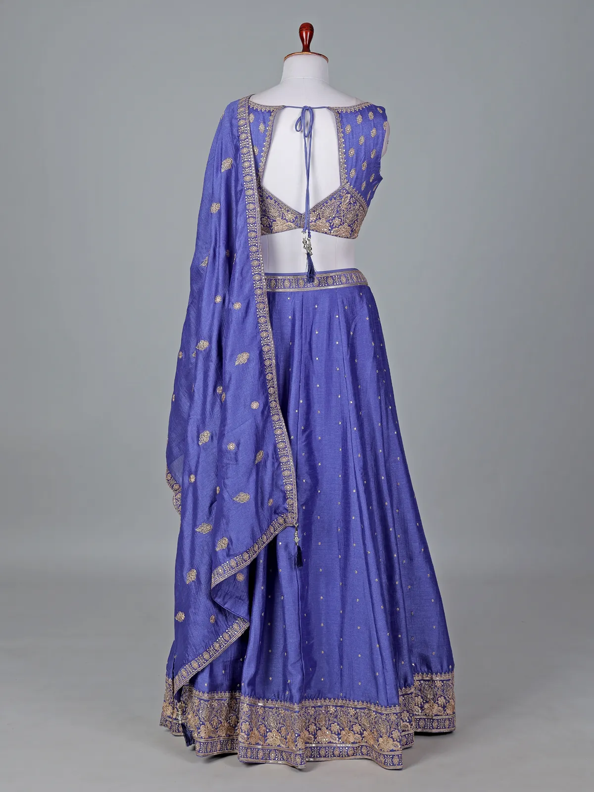 Elegant blue silk lehenga choli with shimmering embroidery details