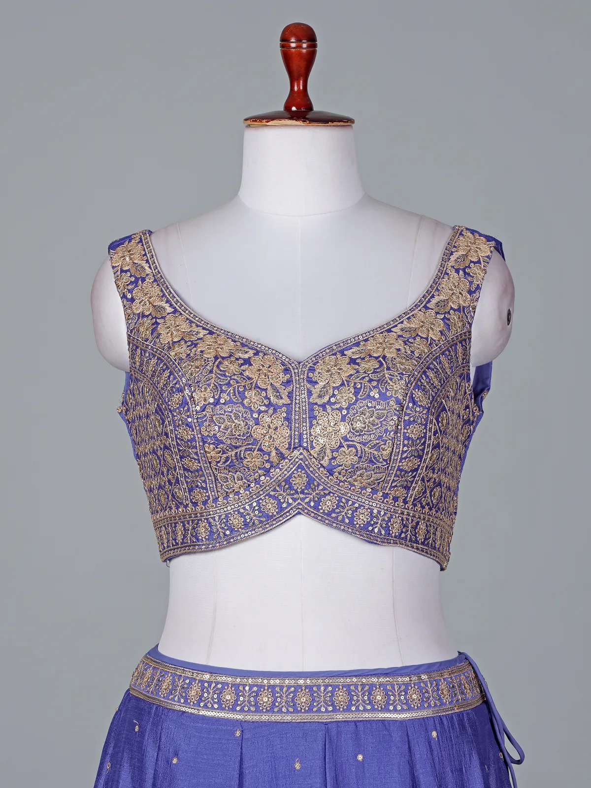 Elegant blue silk lehenga choli with shimmering embroidery details