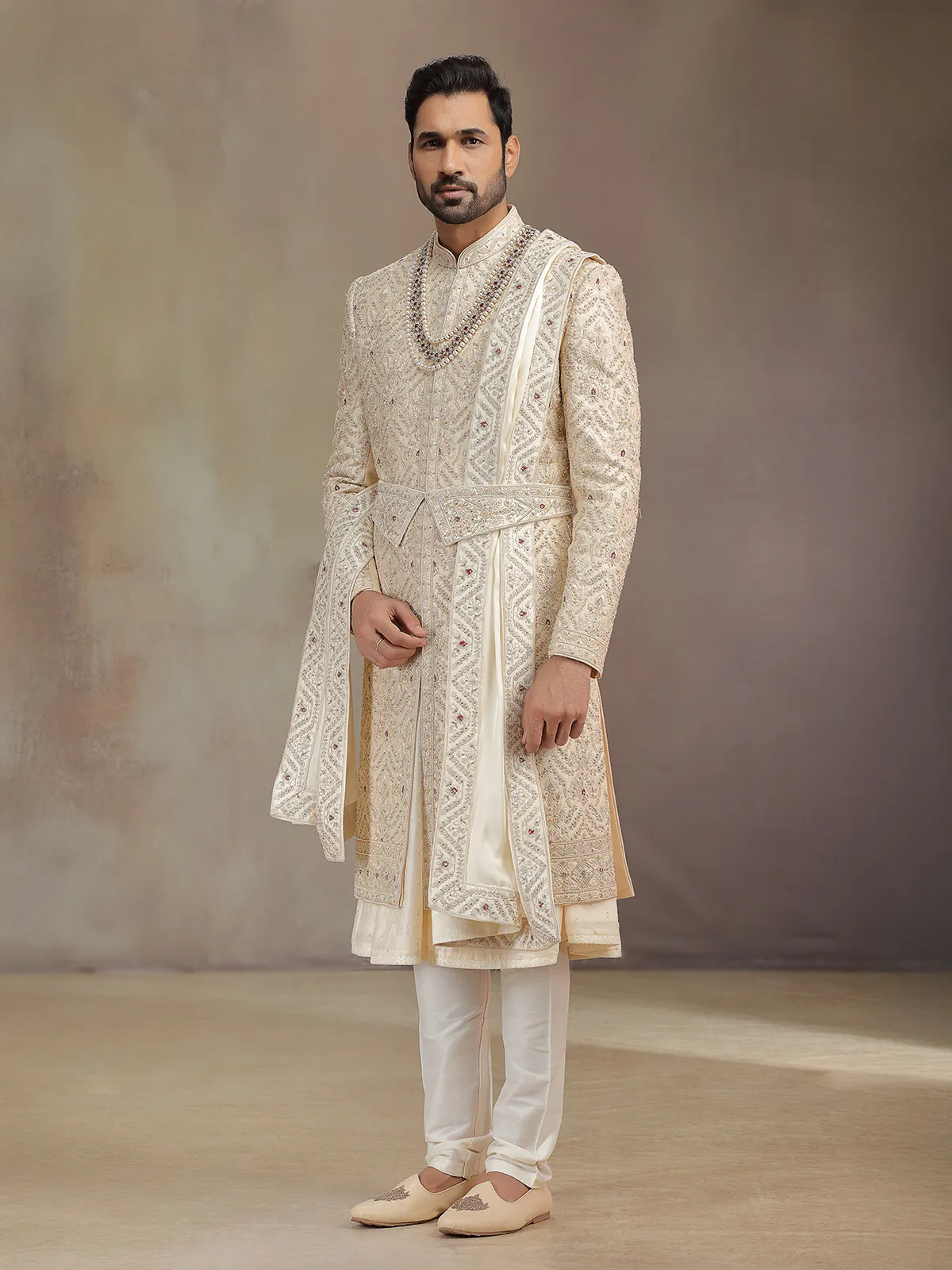 Elegant golden silk peshwa style sherwani for groom