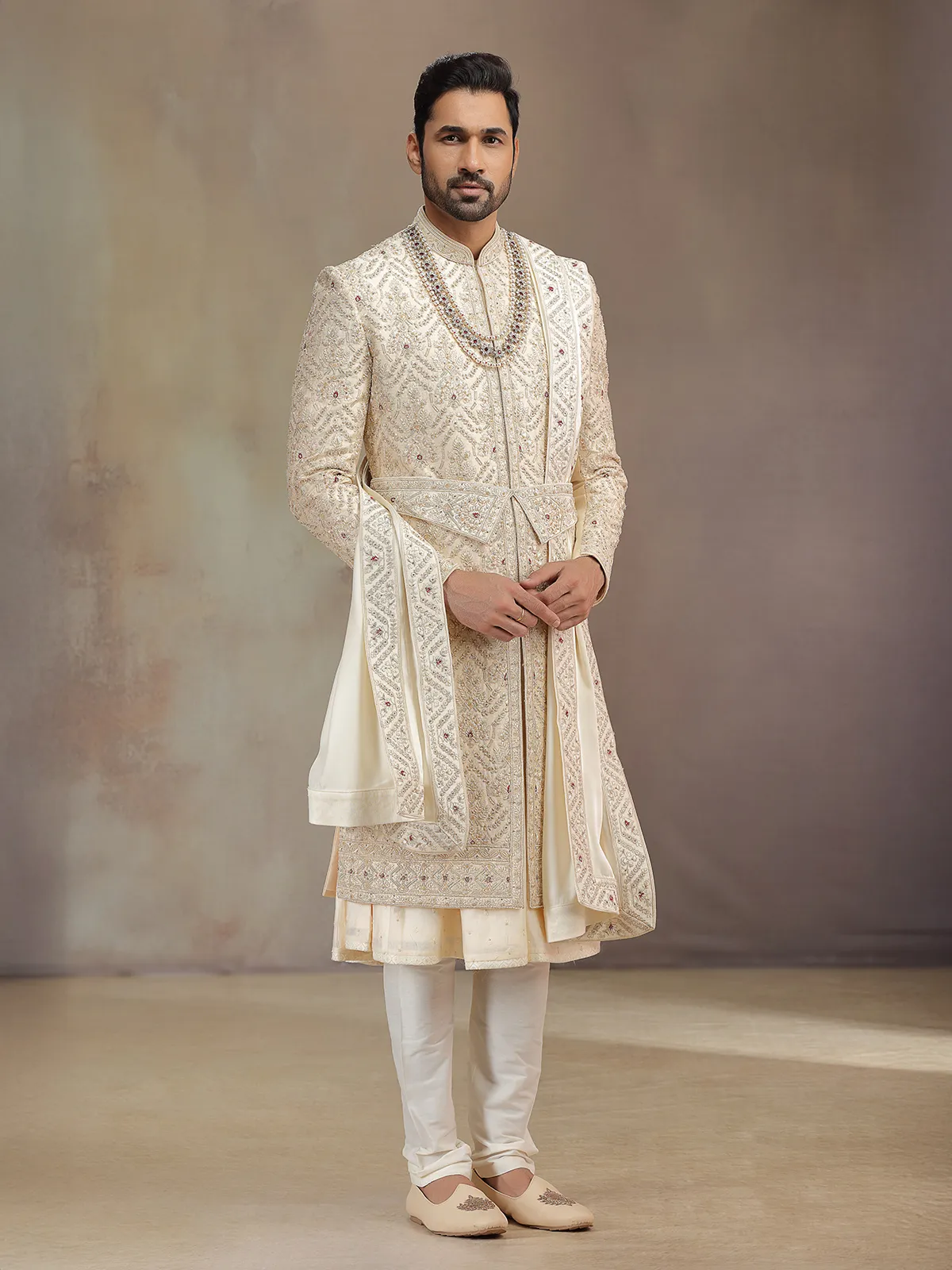 Elegant golden silk peshwa style sherwani for groom