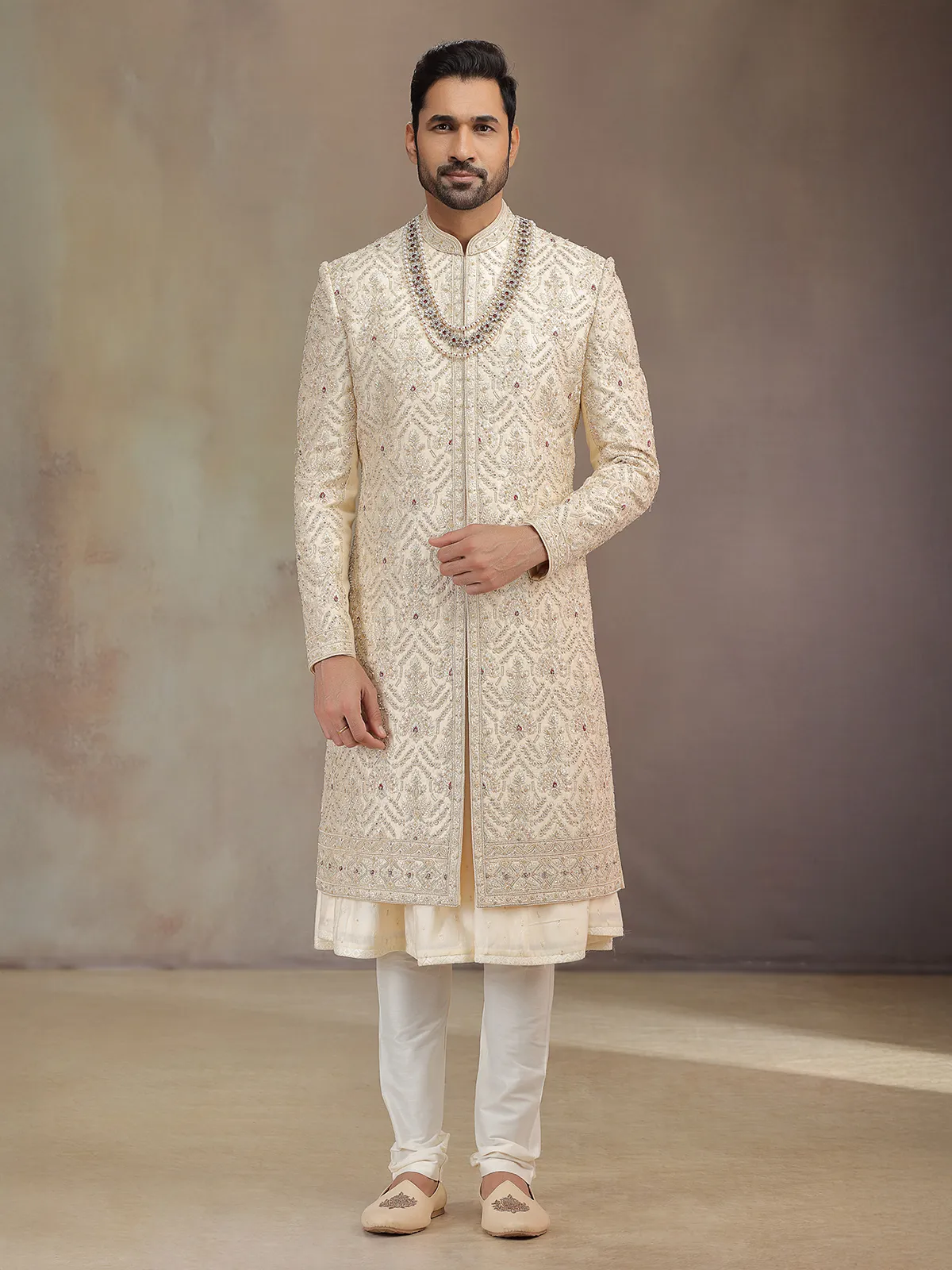 Elegant golden silk peshwa style sherwani for groom