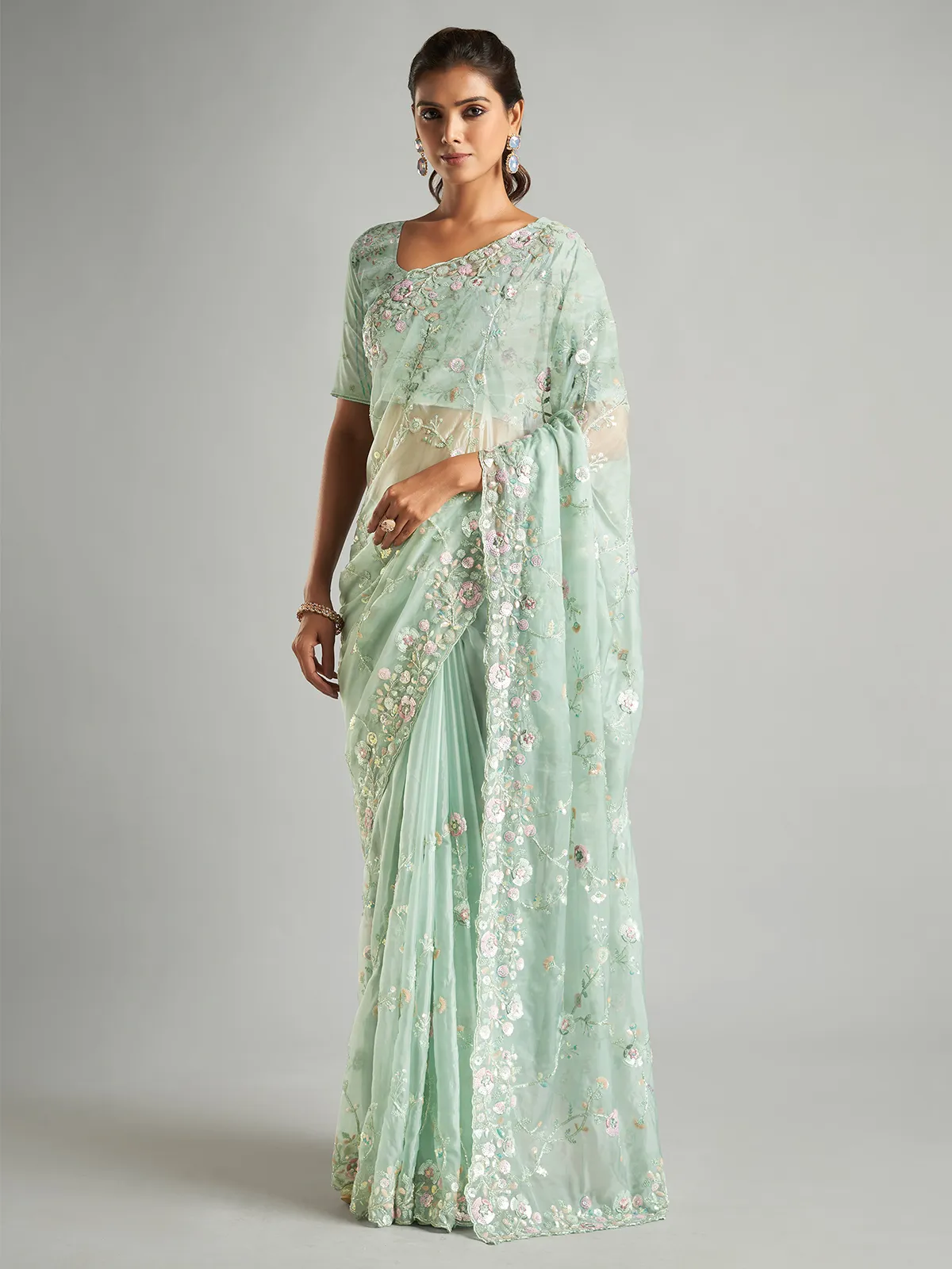 Elegant mint green organza saree