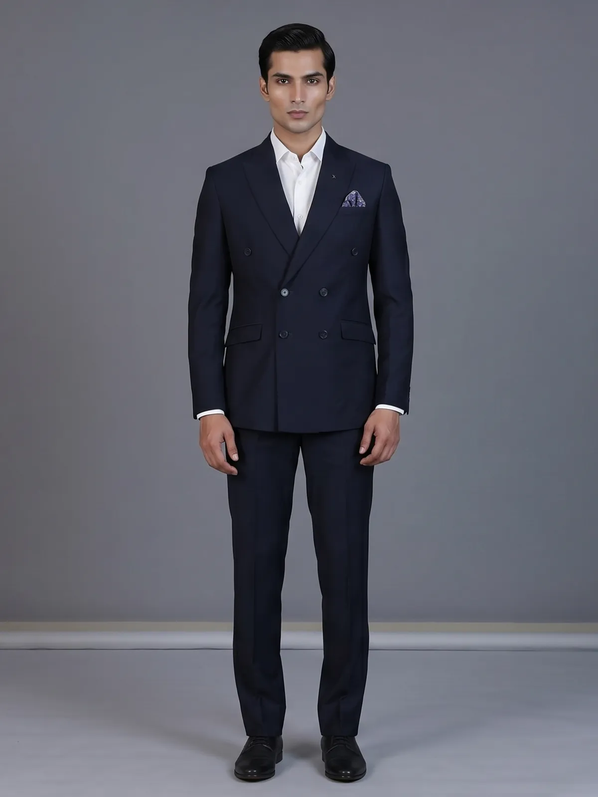 Elegant navy blue formal double breasted suit with peak lapel