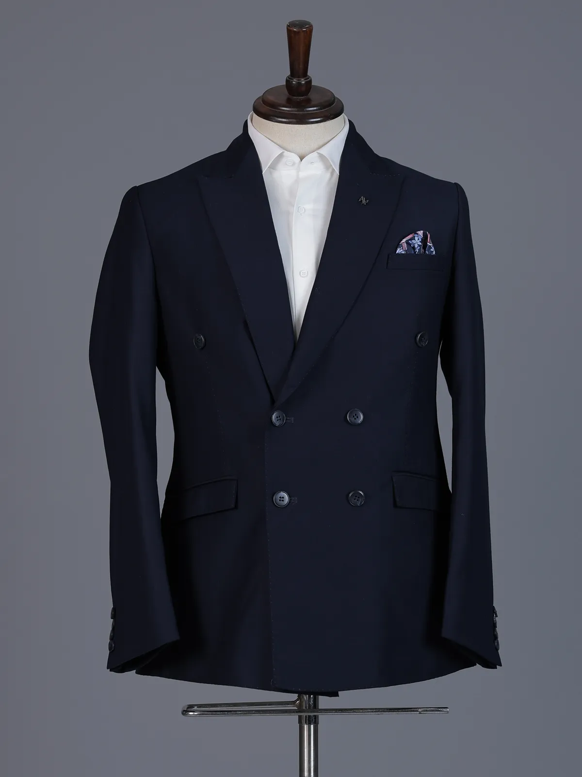 Elegant navy blue formal double breasted suit with peak lapel