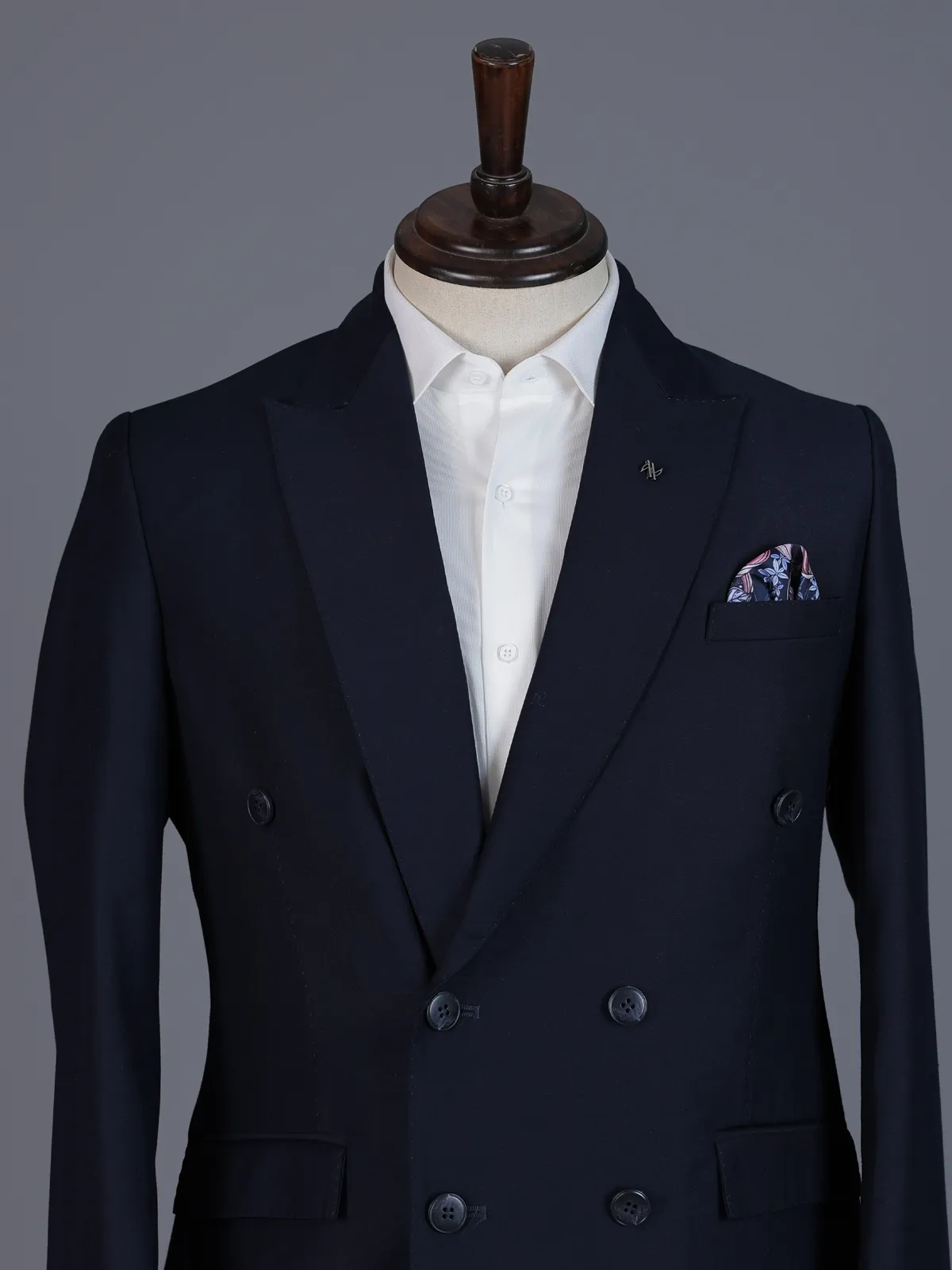 Elegant navy blue formal double breasted suit with peak lapel