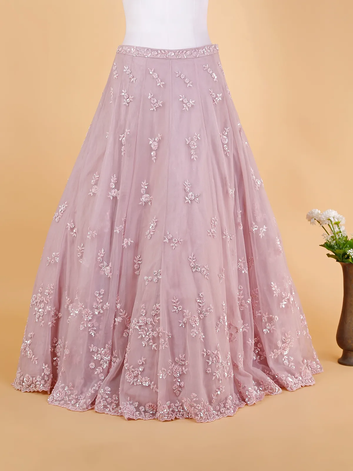 Elegant pink net lehenga suit