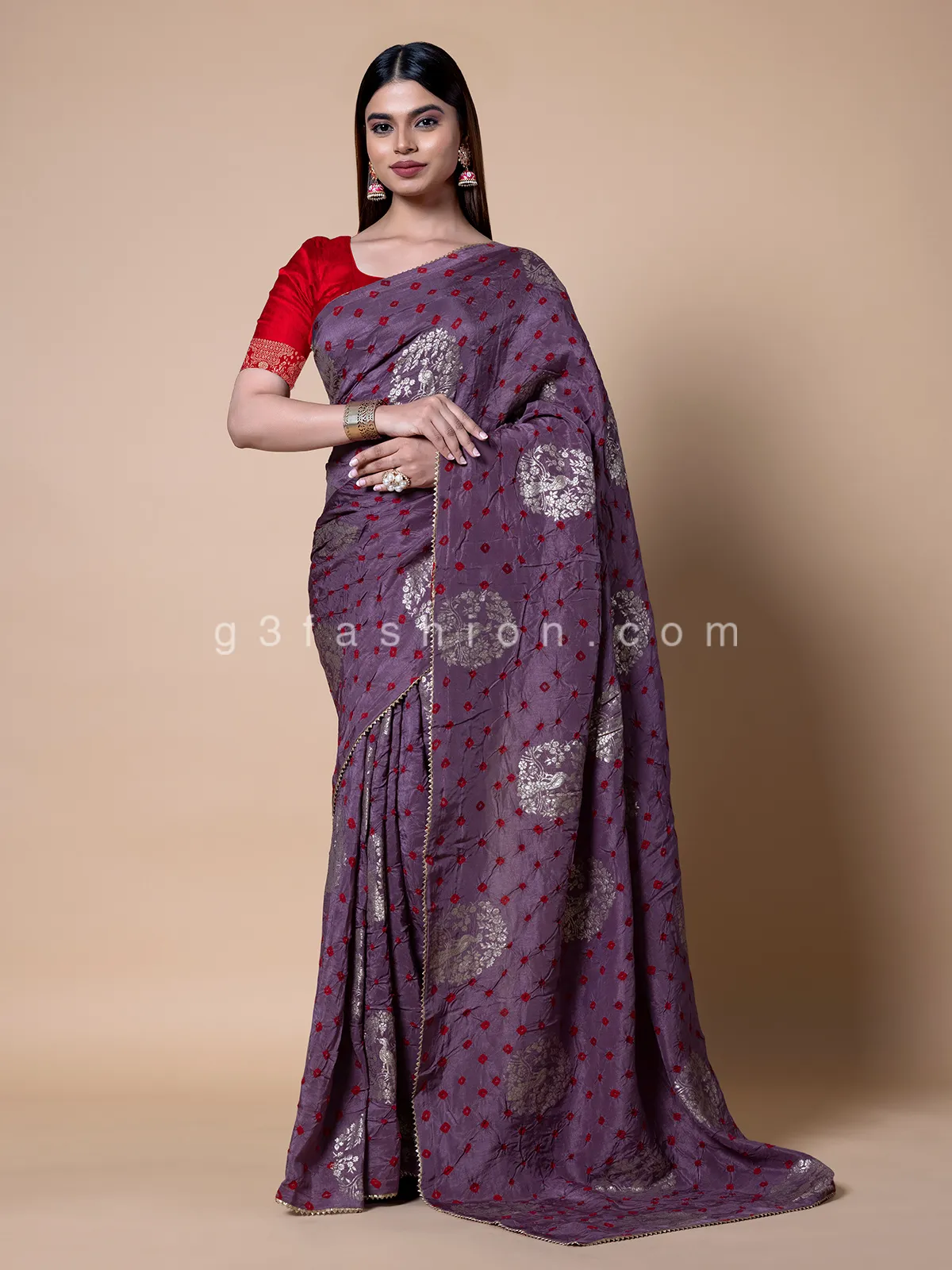 Festive wear purple bandhej saree