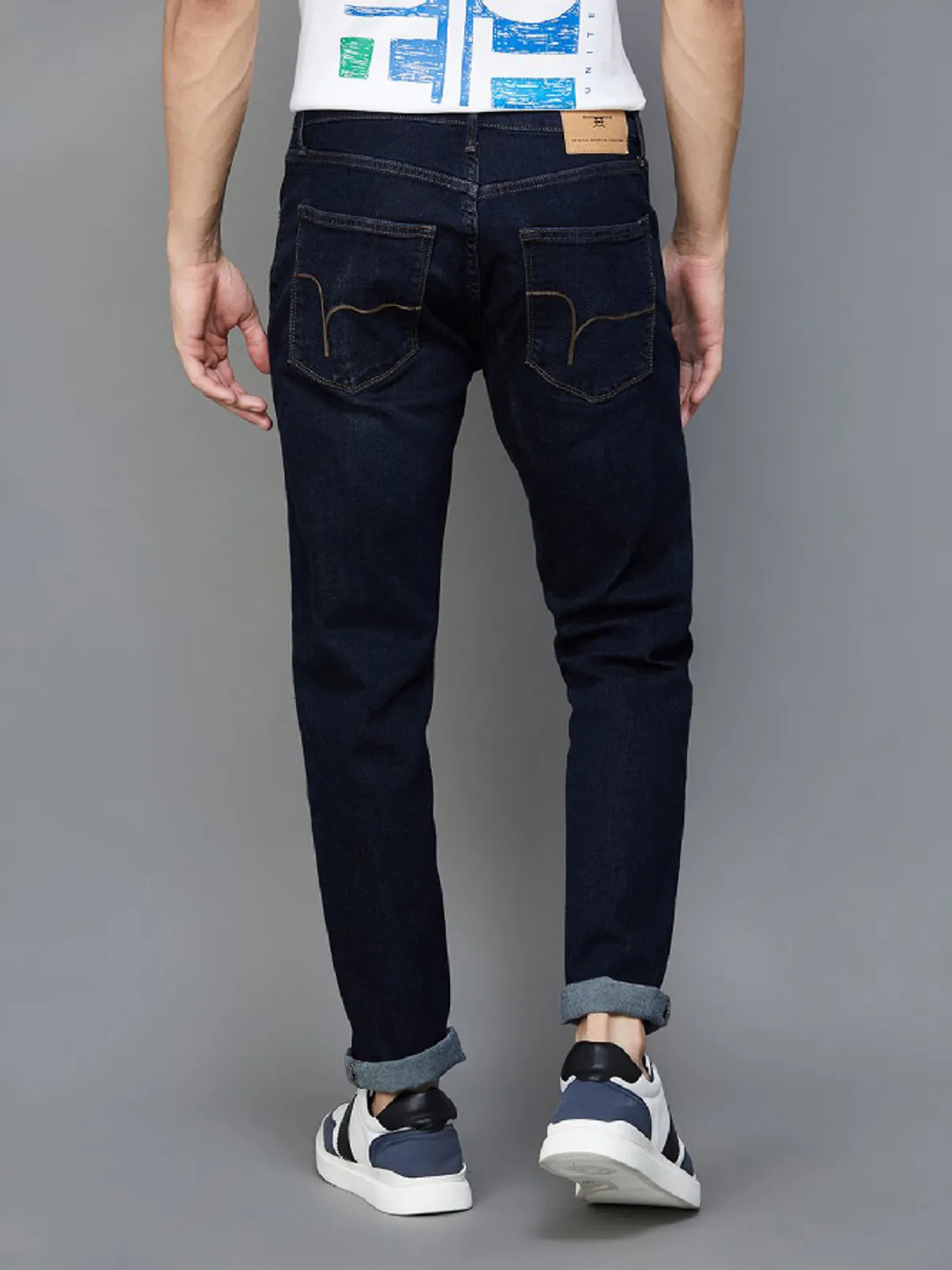 Flying Machine navy solid slim tapered fit jeans