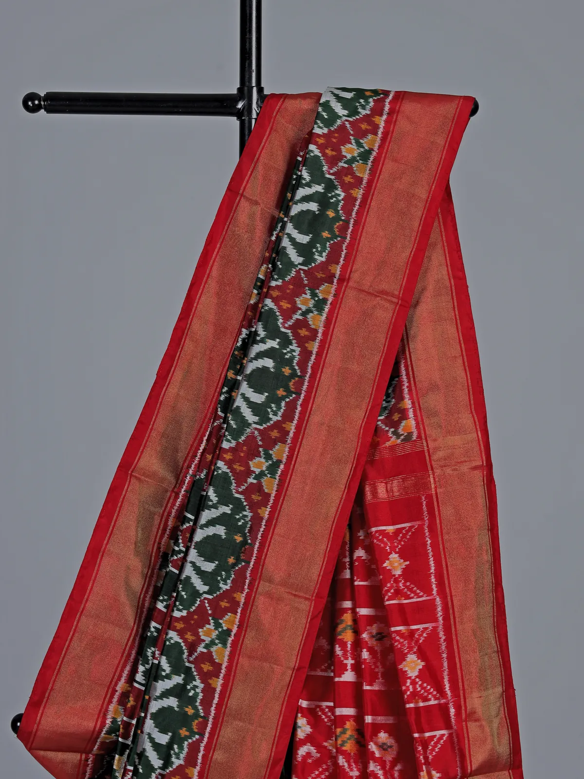 Forest green hyderabadi patola silk saree with ikat artistry