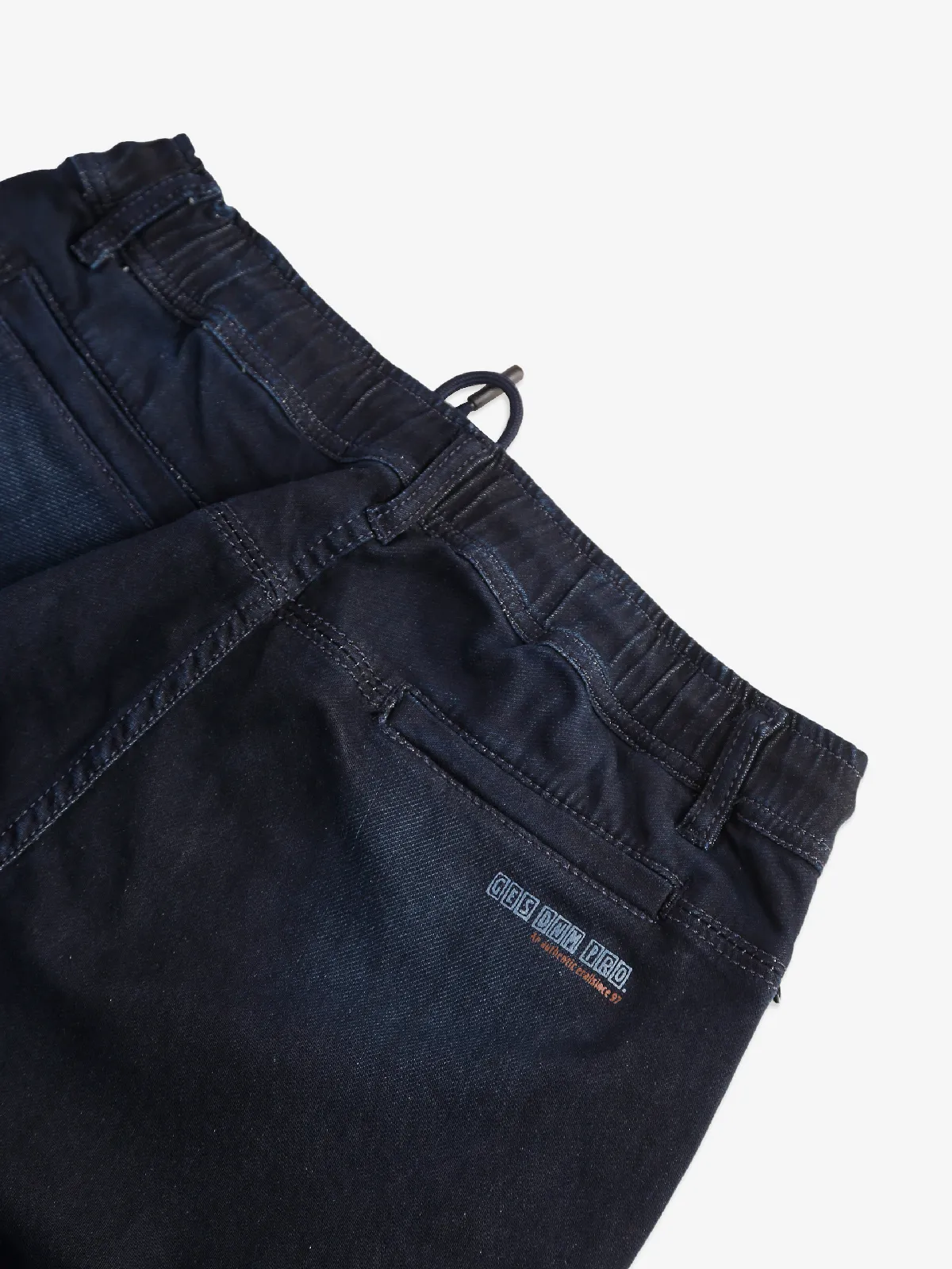 Gesture washed navy jeans