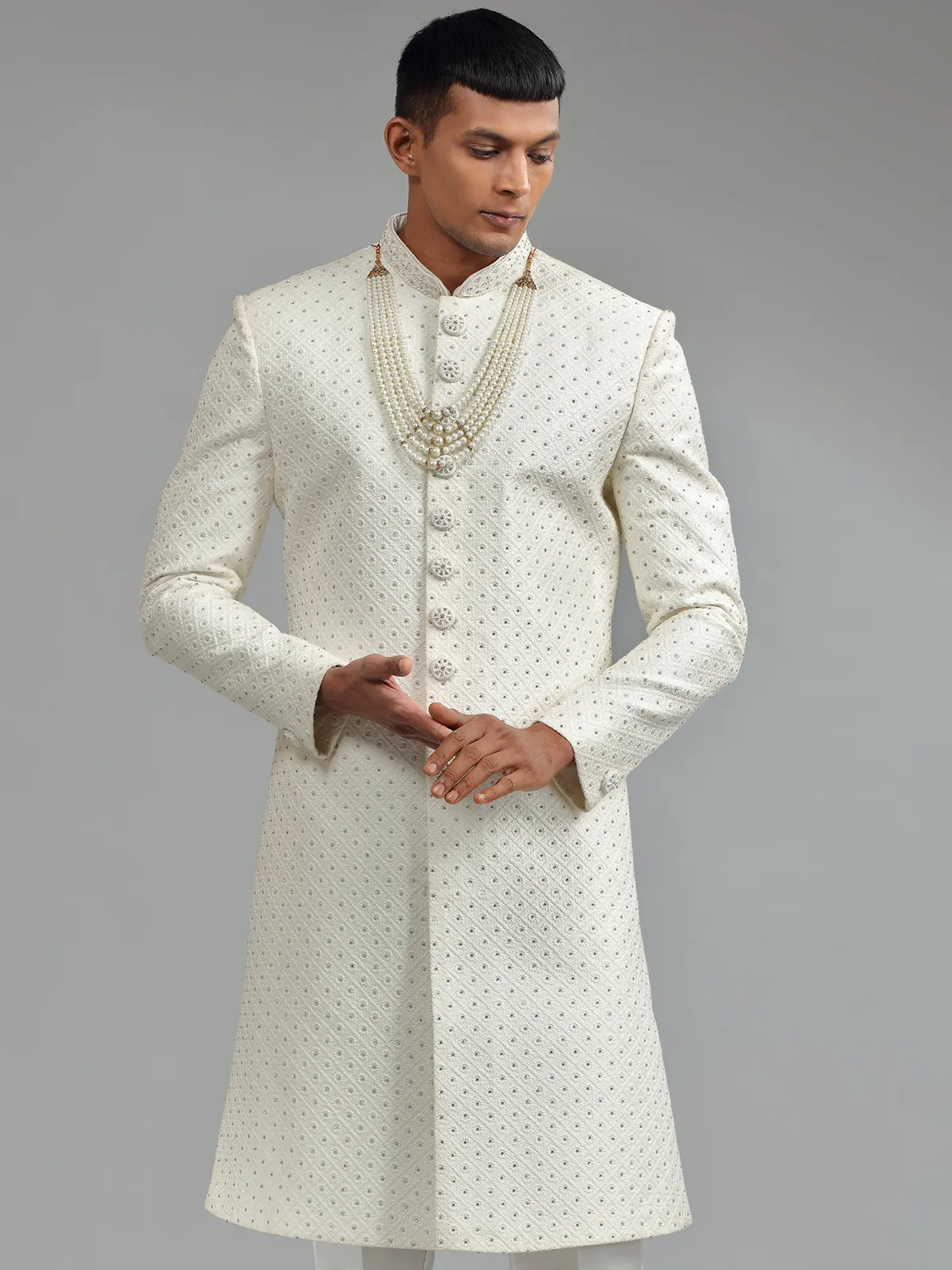Glamorous silk white groom sherwani