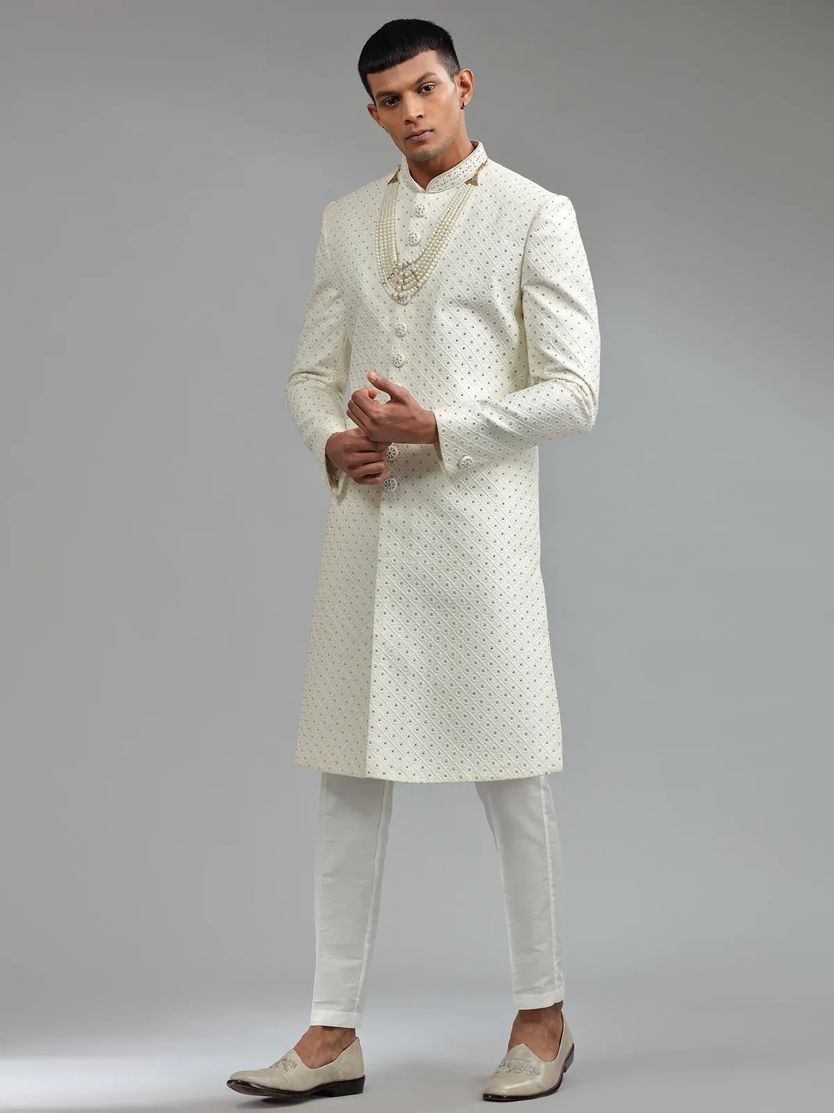 Glamorous silk white groom sherwani