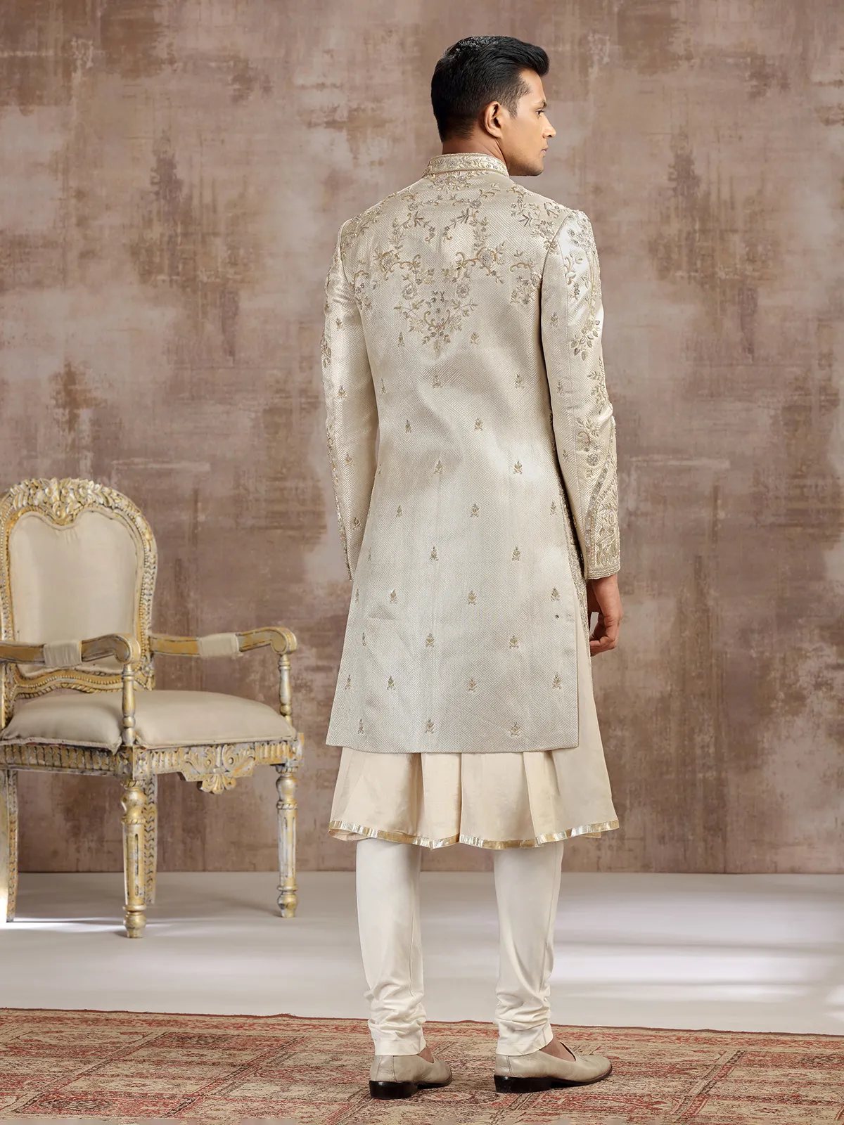 Gold silk peshwai sherwani with classic craftsmanship