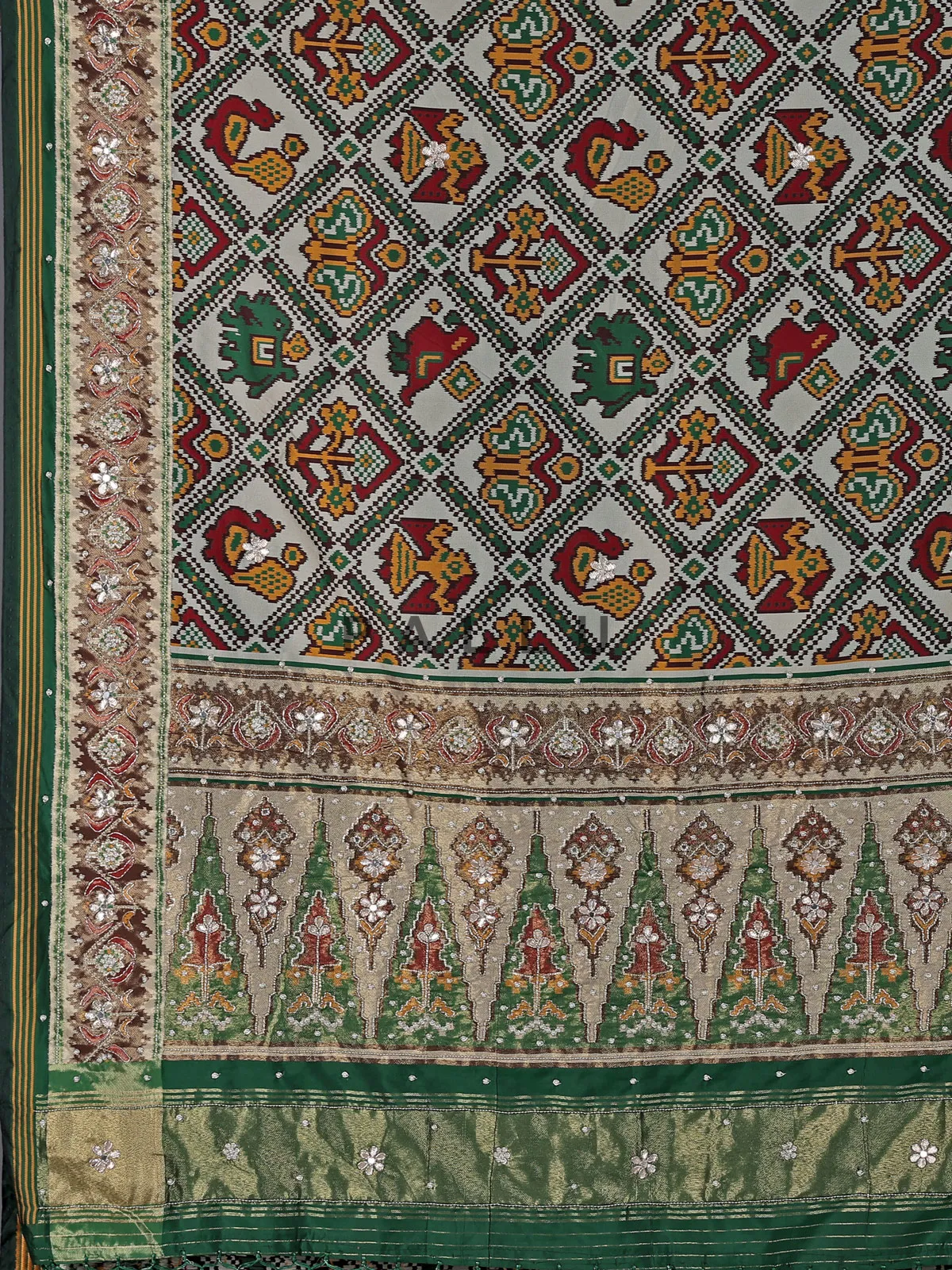Green and off white art patola silk saree with motifs