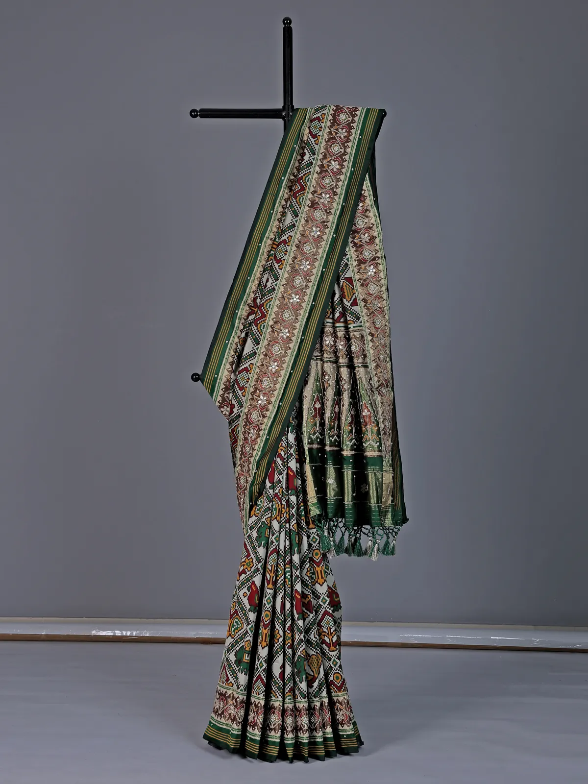 Green and off white art patola silk saree with motifs