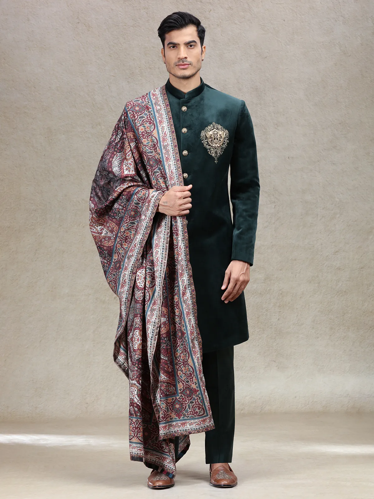 Green royal charming velvet sherwani with elephant patch