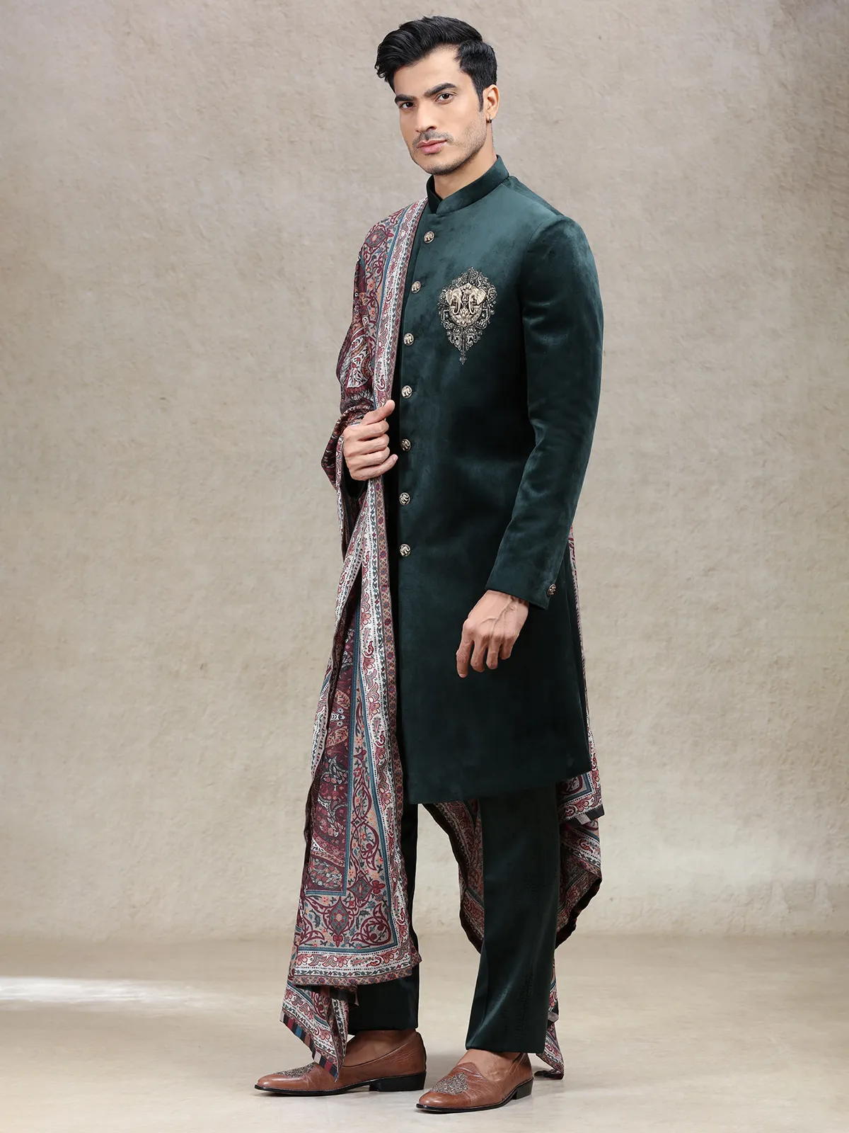 Green royal charming velvet sherwani with elephant patch