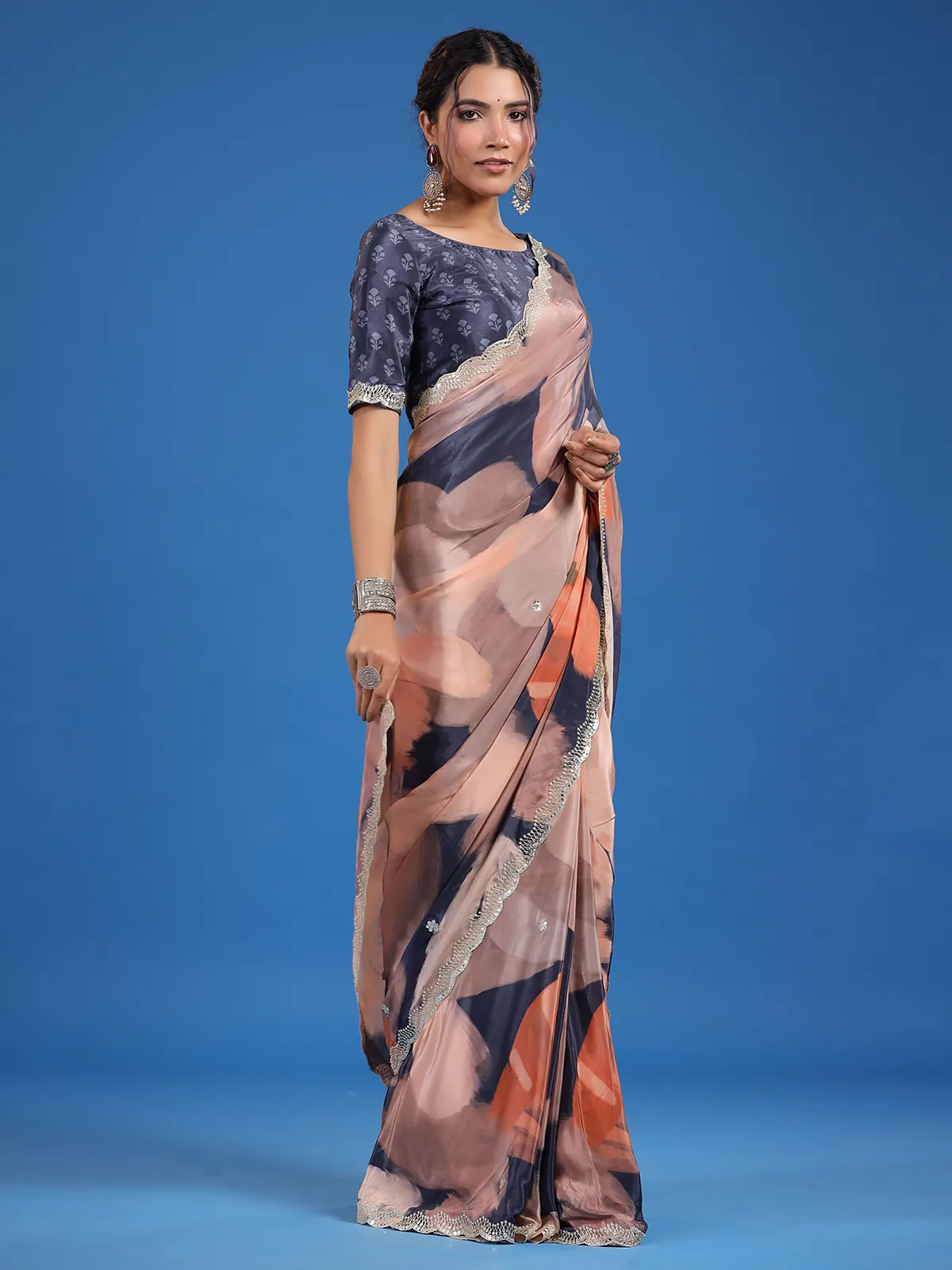 Grey and peach printed muslin silk saree